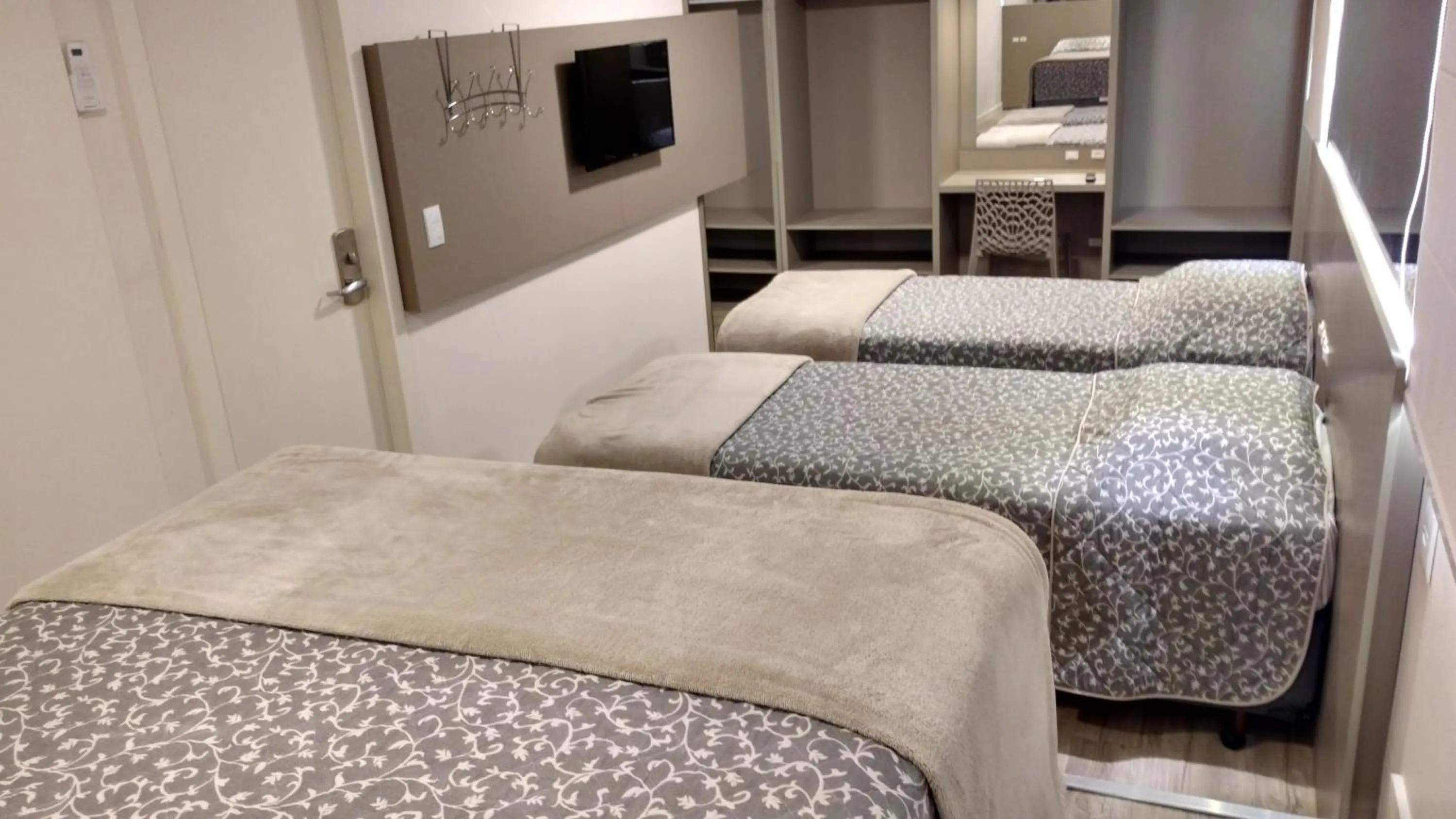 Bed in Hotel Palmas Executivo