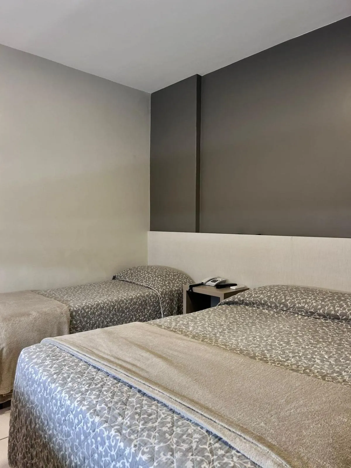 Bed in Hotel Palmas Executivo