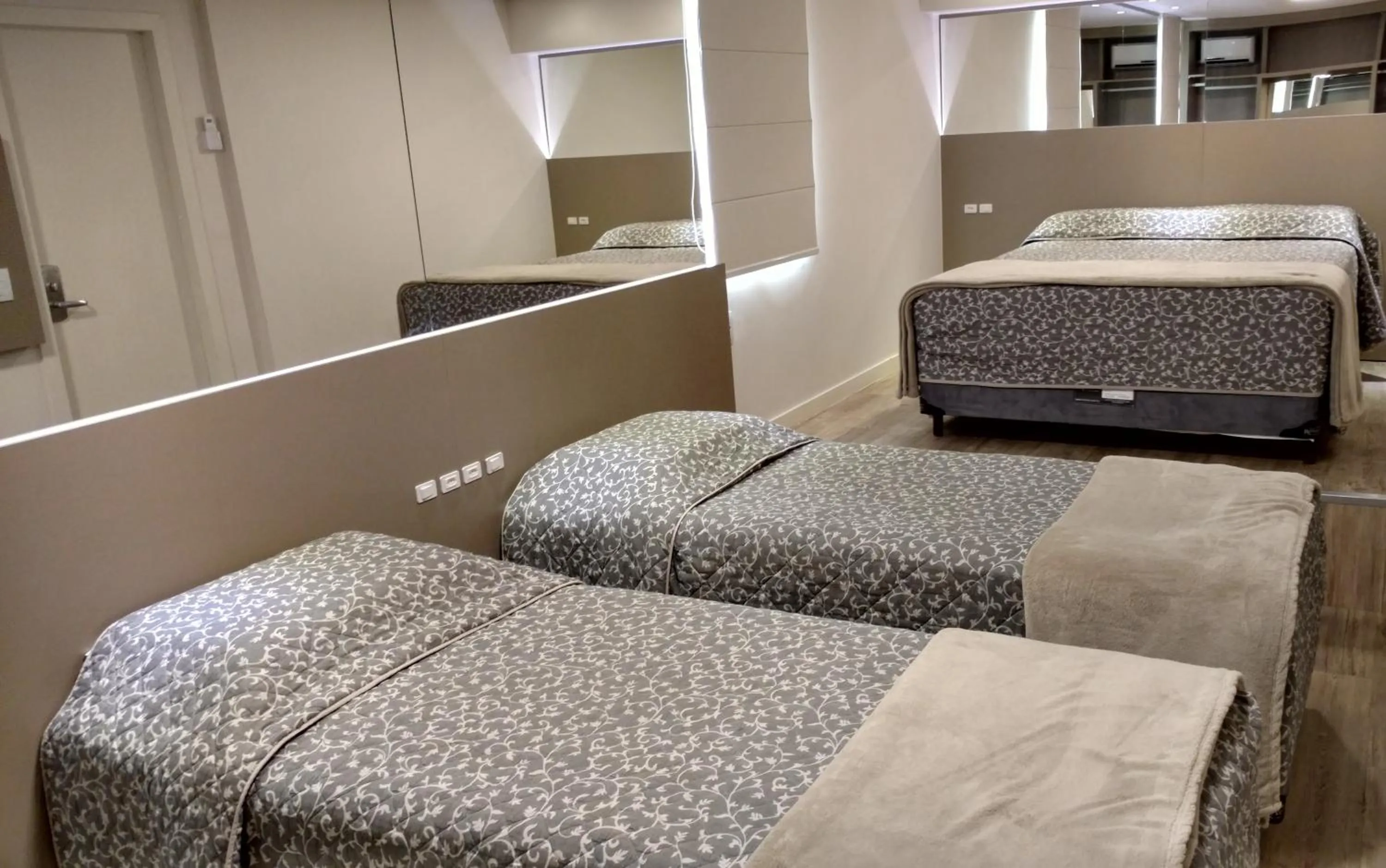 Bed in Hotel Palmas Executivo