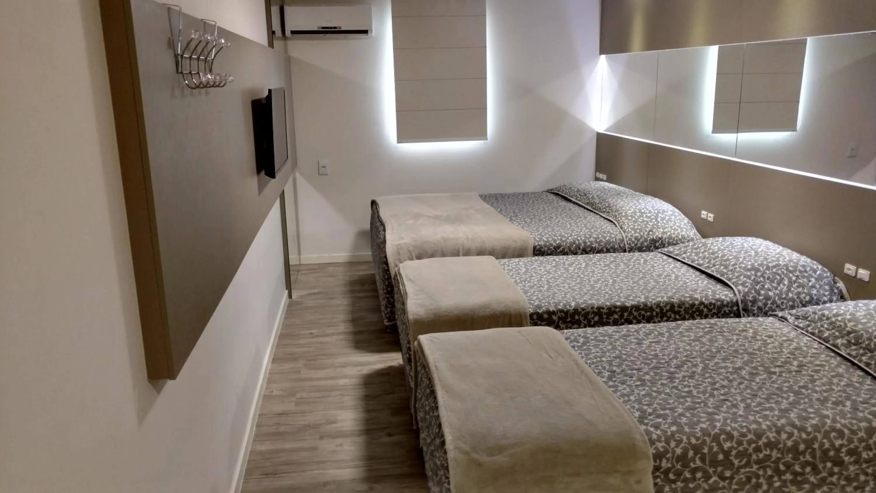 Bed in Hotel Palmas Executivo