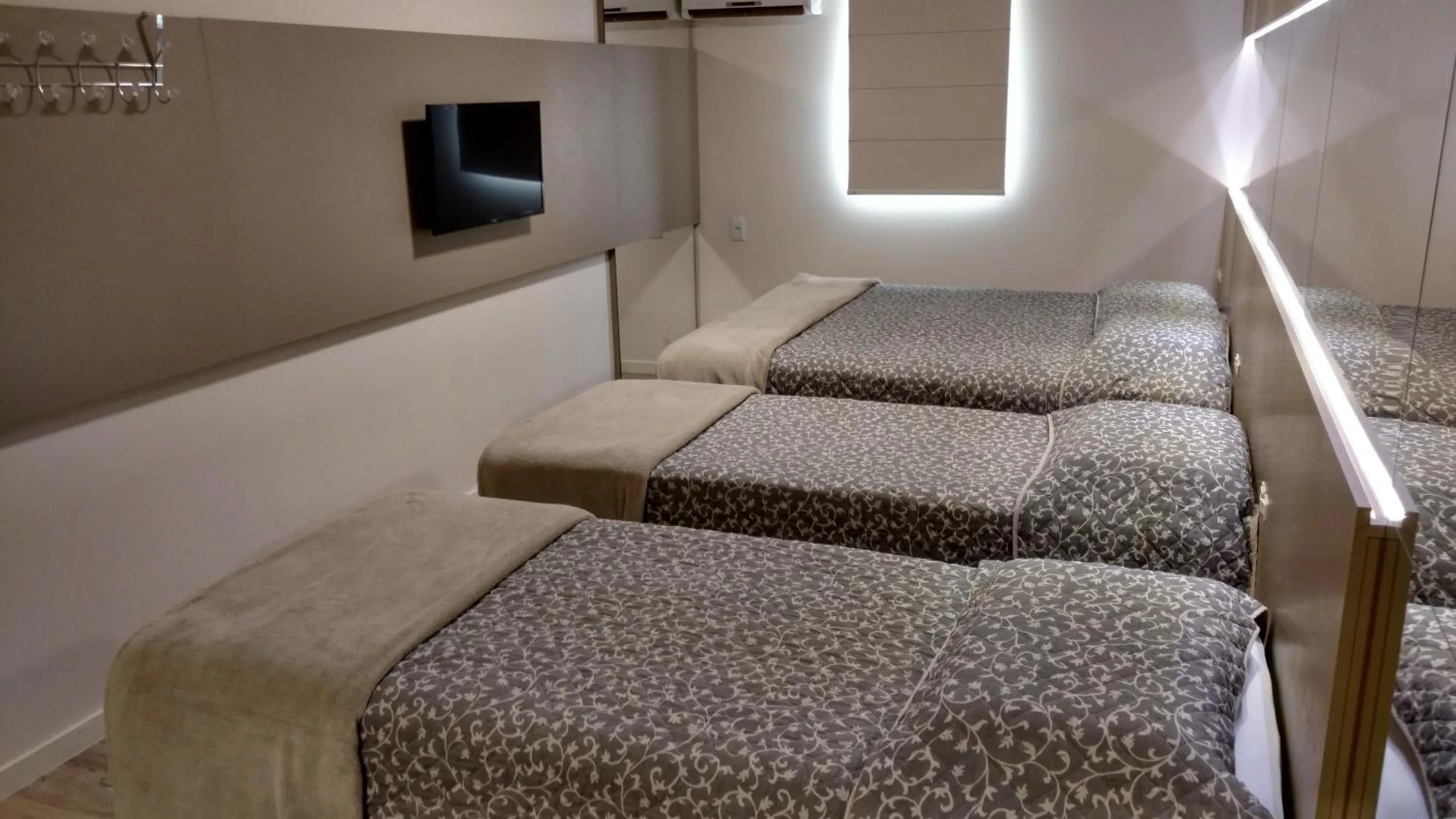 Bed in Hotel Palmas Executivo