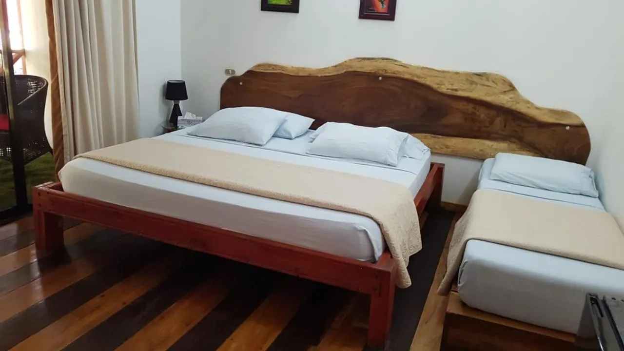 Bed in Hotel Bugabutik