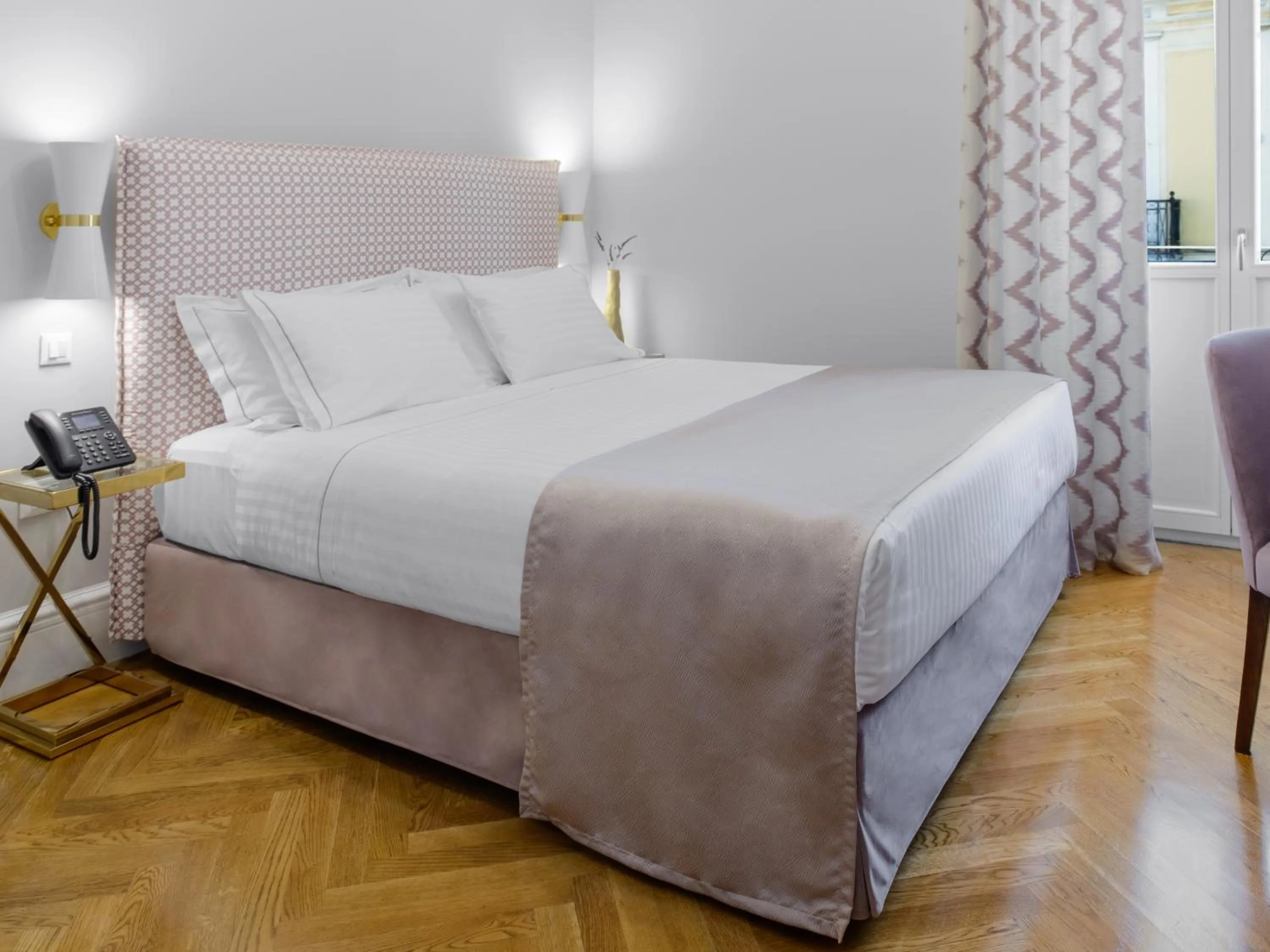 Bed in MiraMe Athens Boutique Hotel