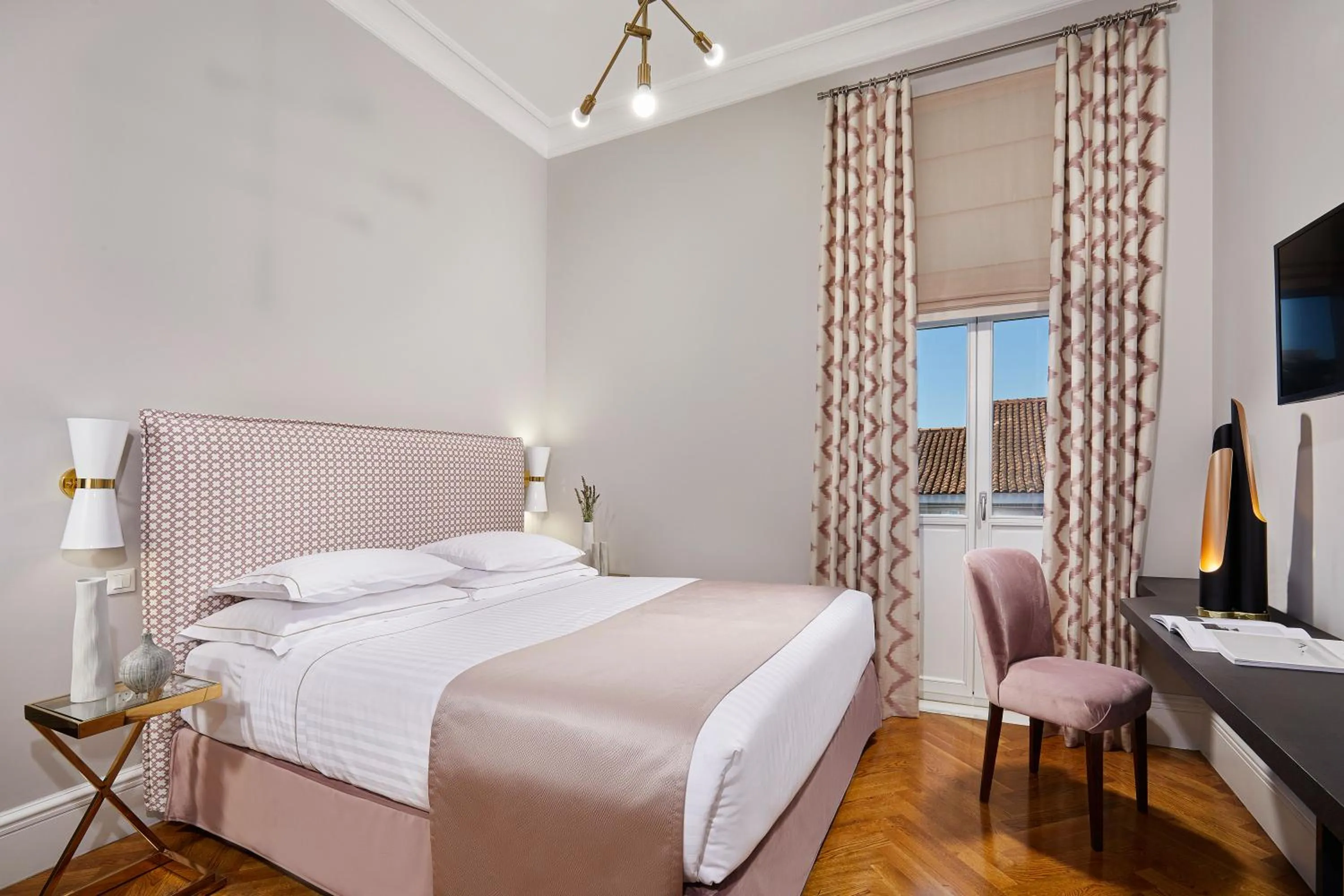 Bed in MiraMe Athens Boutique Hotel