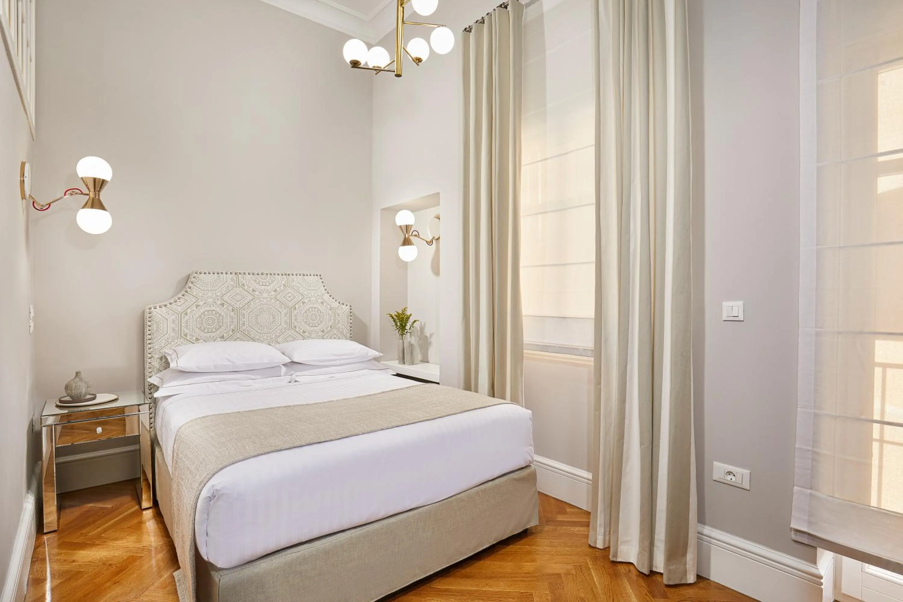 Bed in MiraMe Athens Boutique Hotel