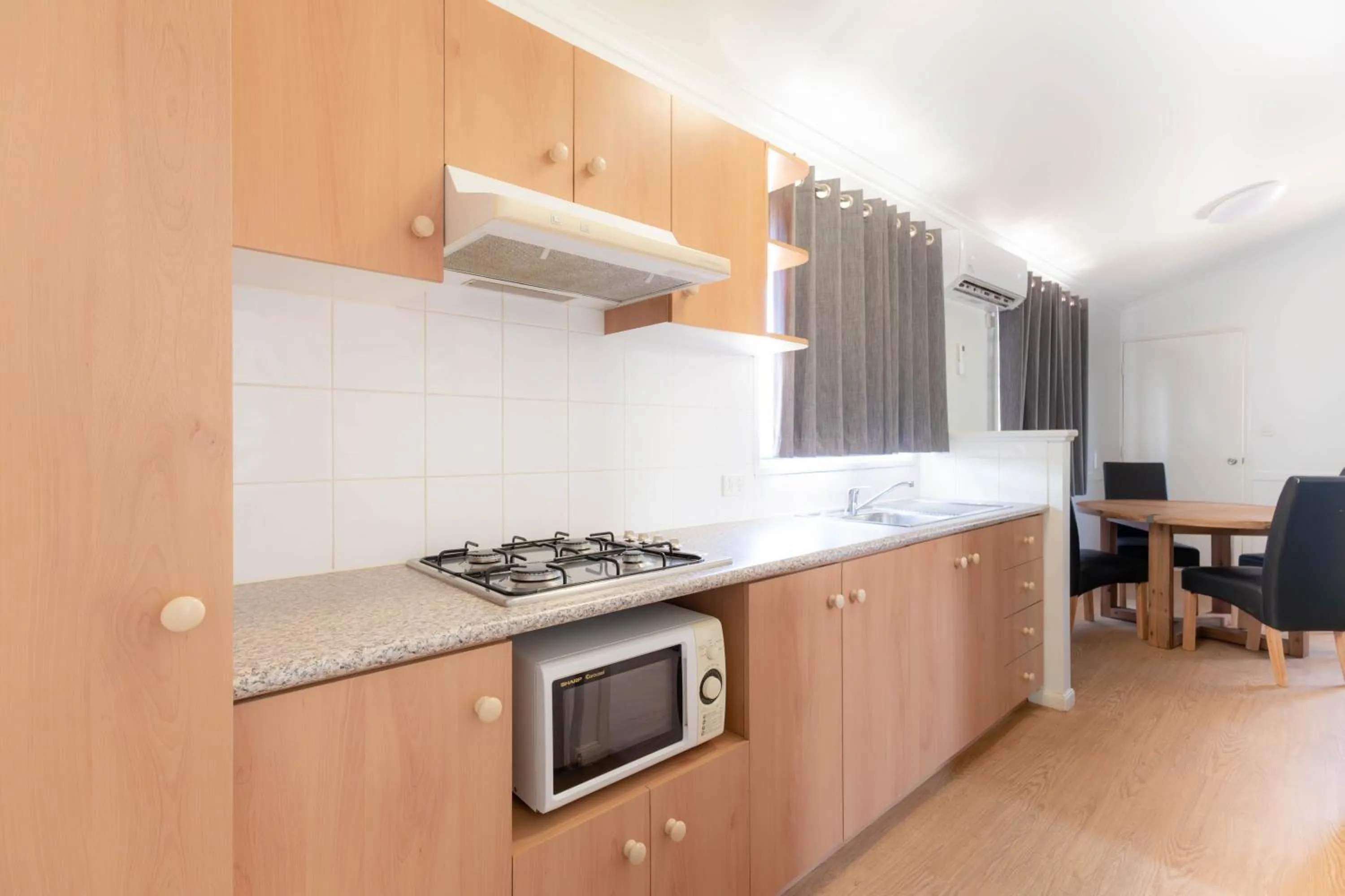 Kitchen or kitchenette in Ningaloo Caravan and Holiday Resort