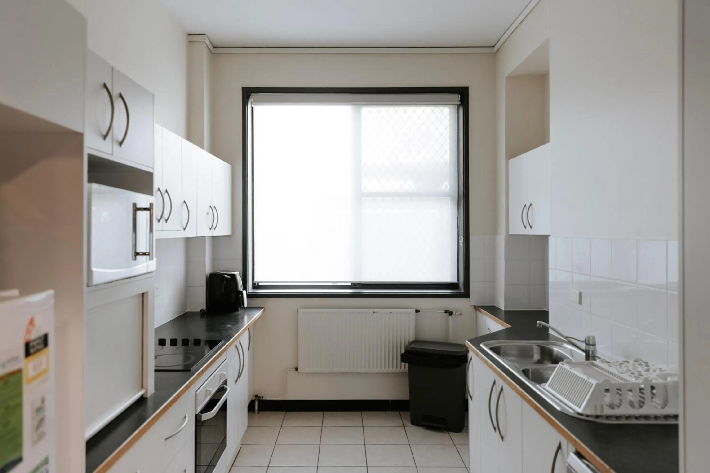 Kitchen or kitchenette in Canberra Accommodation Centre