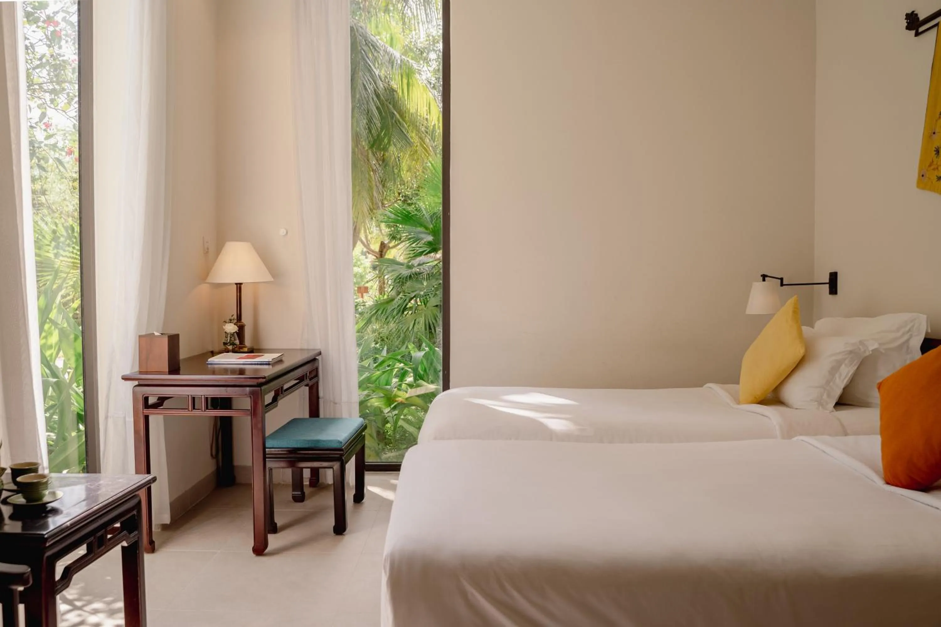 Bed in Pax Ana Doc Let Resort & Spa