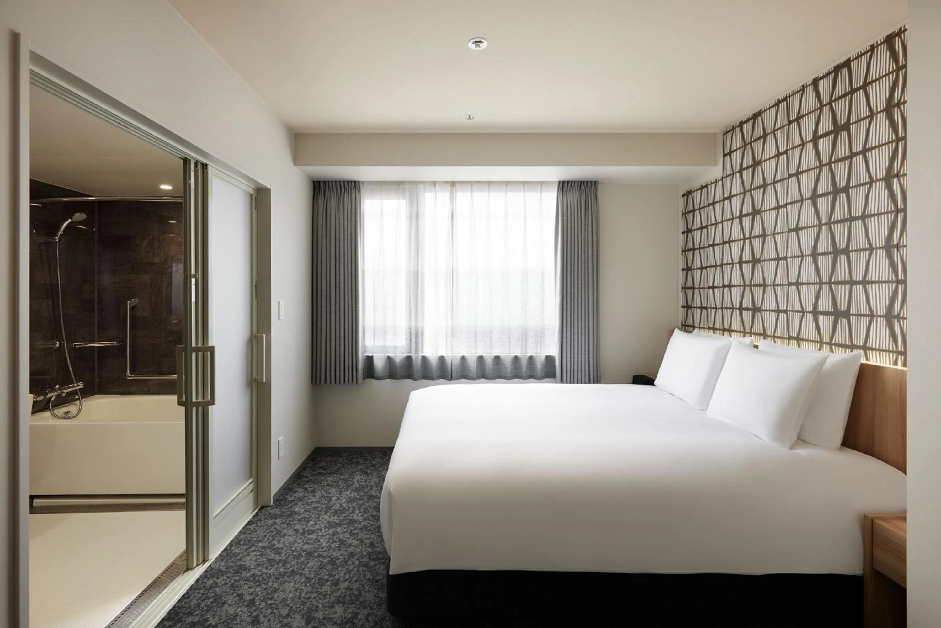 Facility for disabled guests, Bed in Oakwood Hotel Oike Kyoto