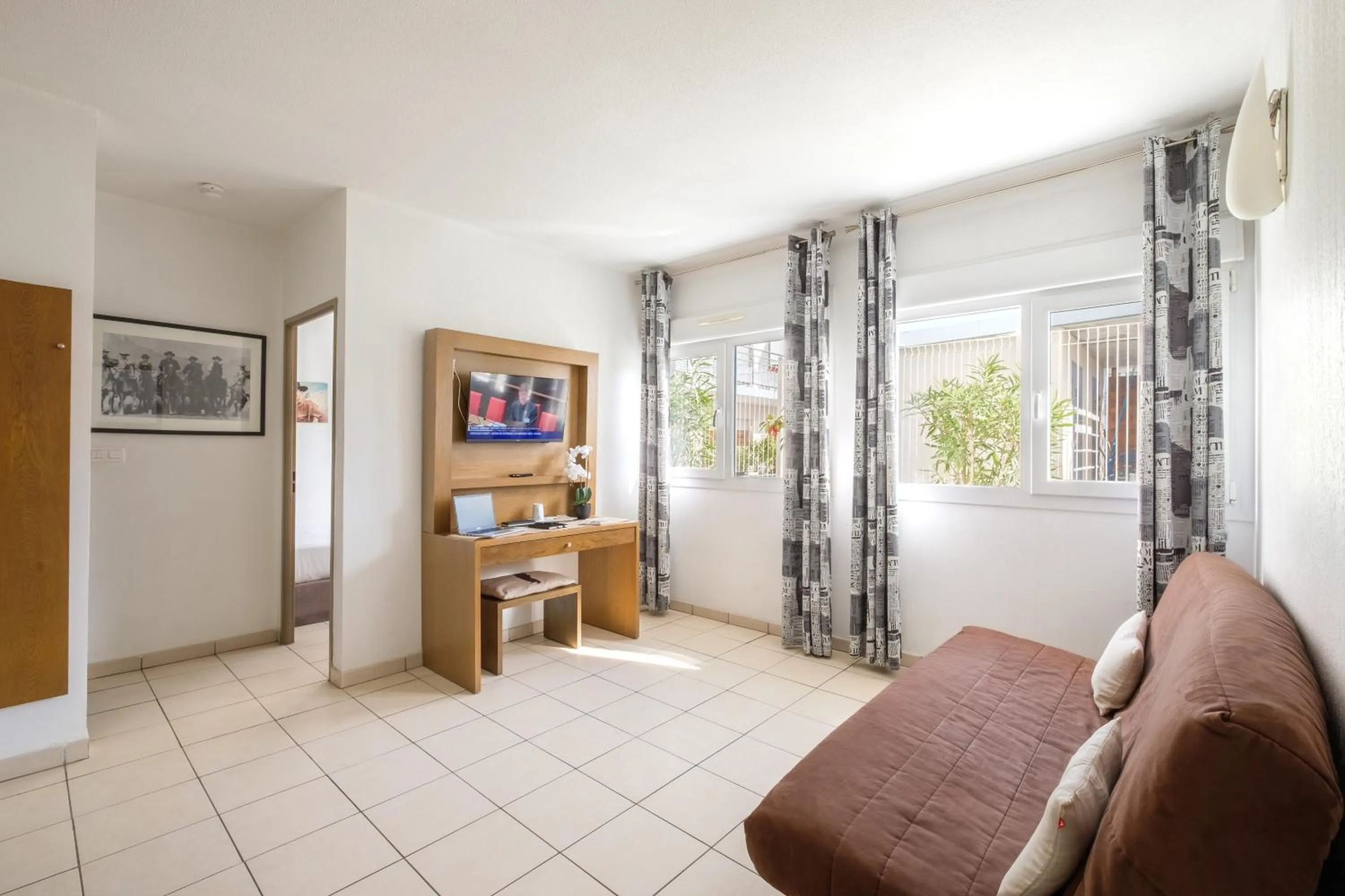 Living room in Comfort Aparthotel Antibes Le Maestria