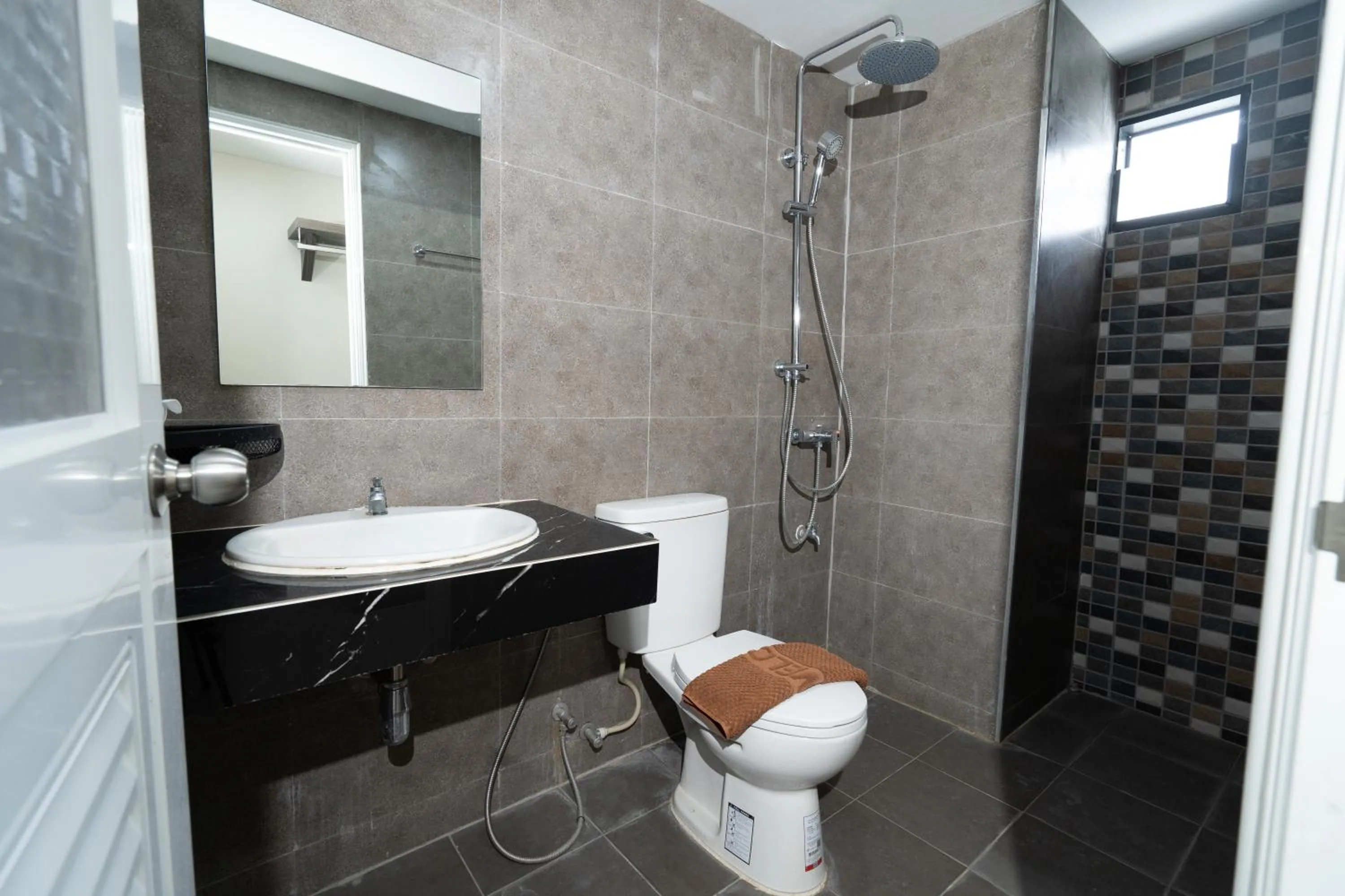 Shower in We Resident Hotel