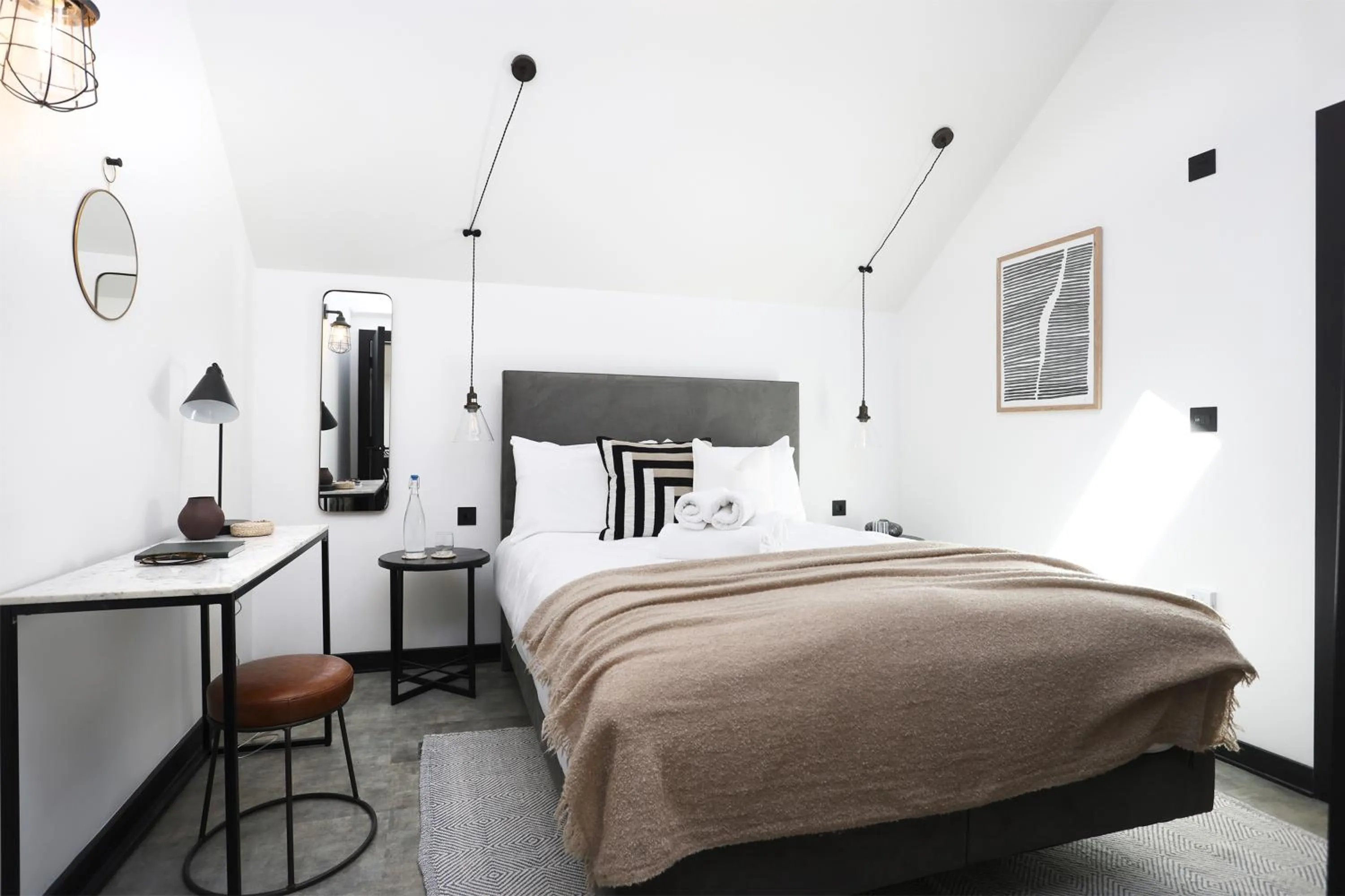 Bed in The Brewers Rooms Contemporary Aparthotel