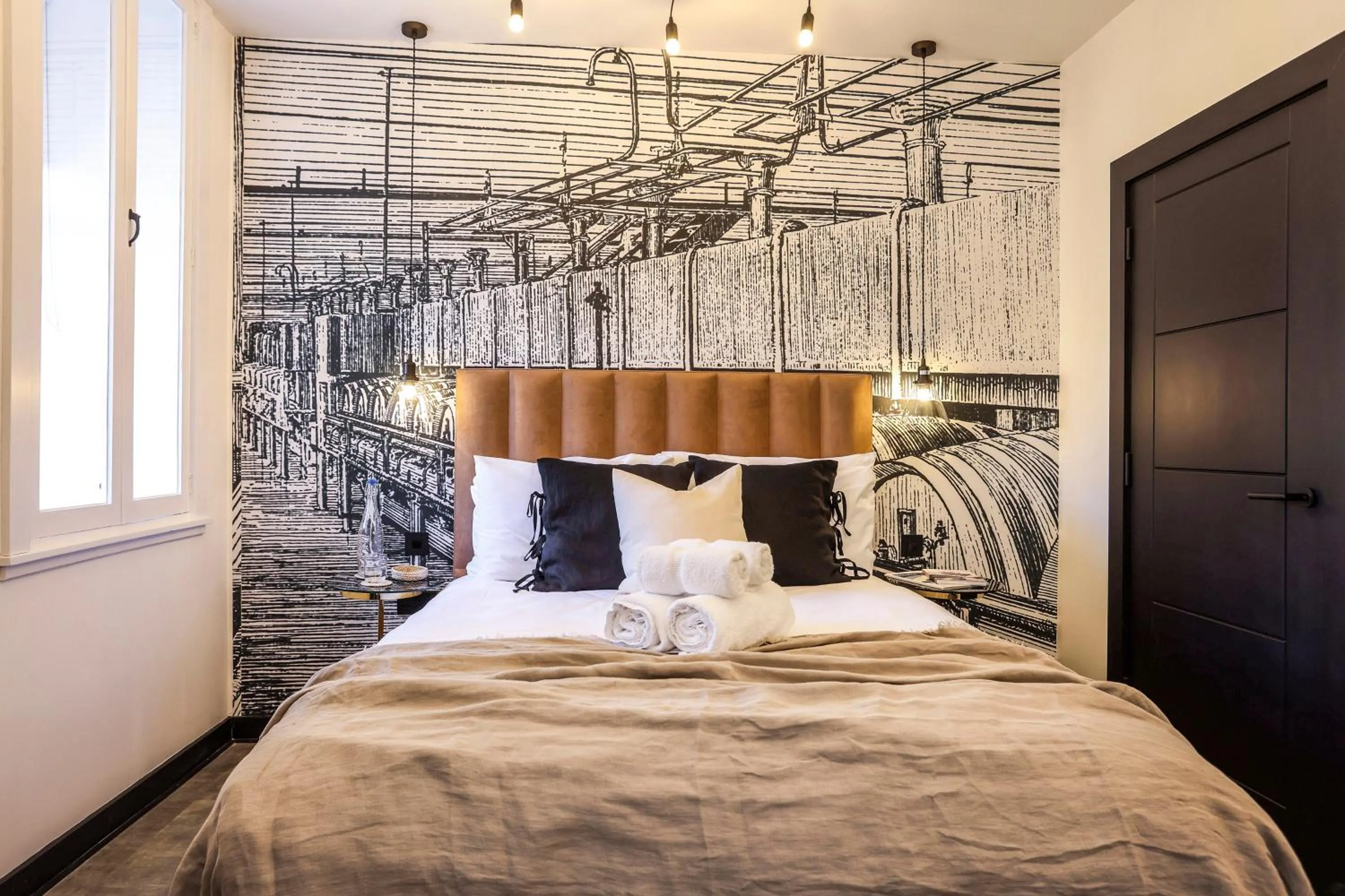 Bed in The Brewers Rooms Contemporary Aparthotel