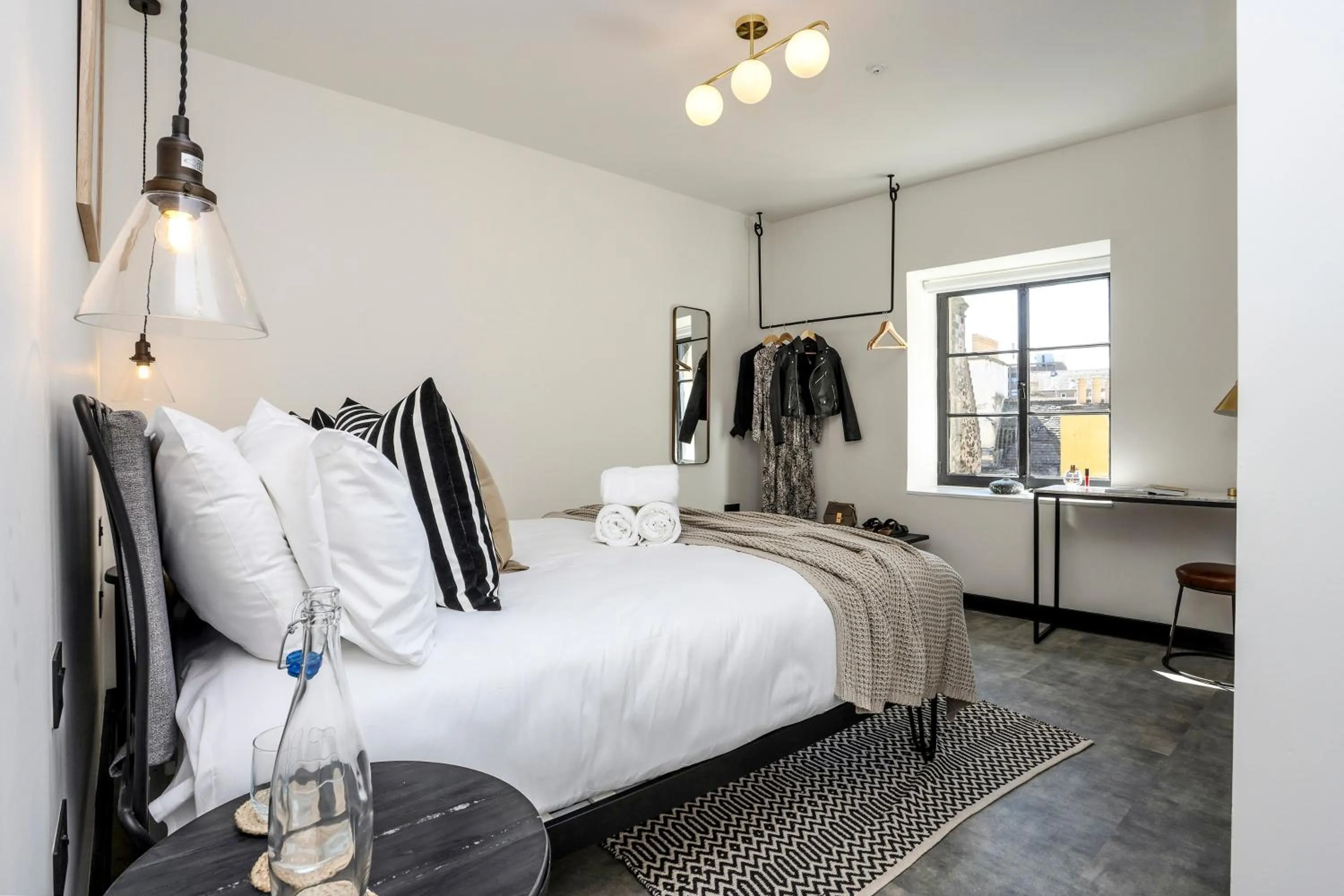 Bed in The Brewers Rooms Contemporary Aparthotel