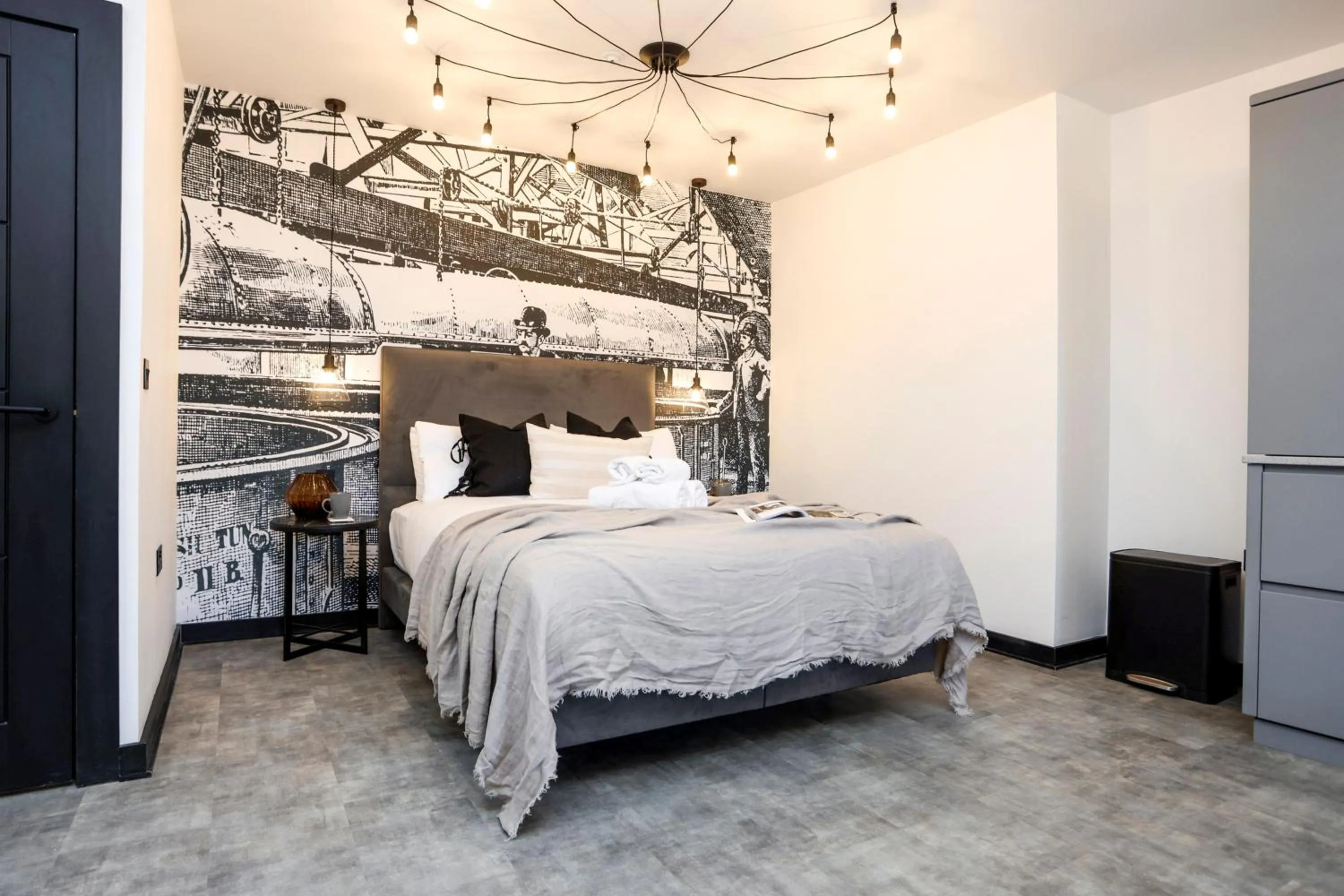 Bed in The Brewers Rooms Contemporary Aparthotel