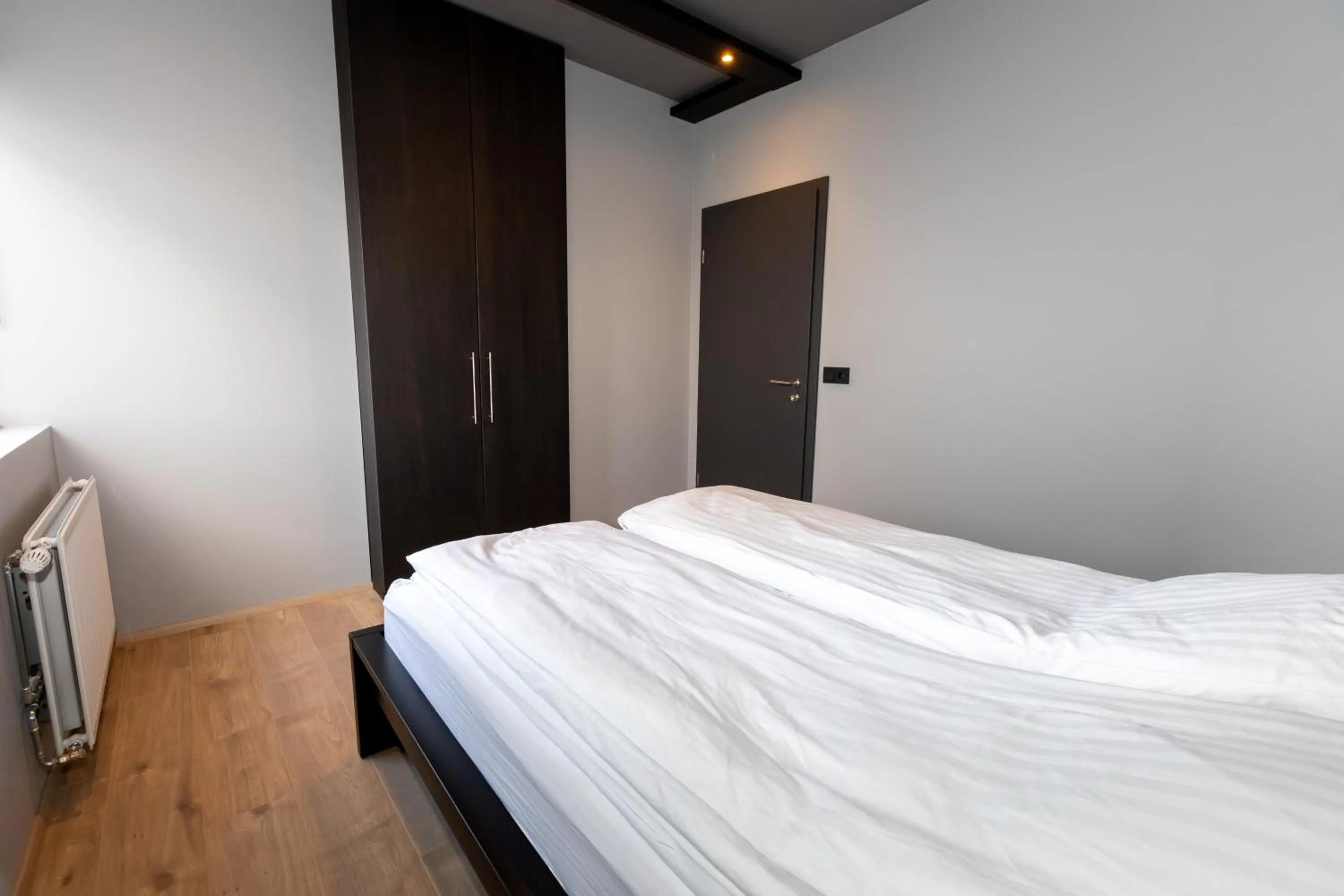 Bedroom, Bed in Akureyri Lux Apartments with hot tub access