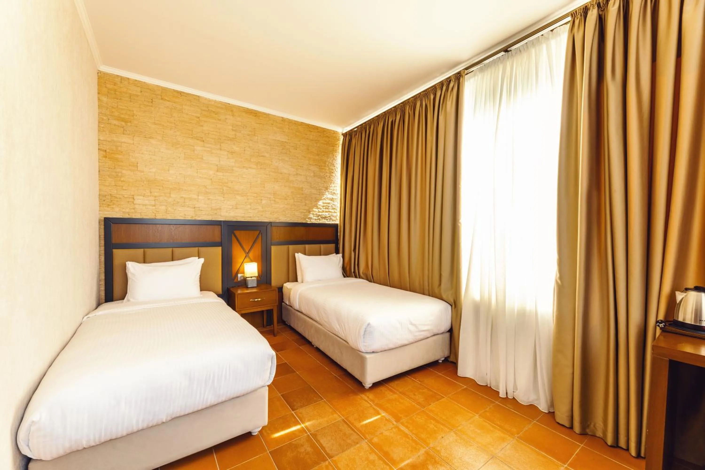 Bed in Hotel Chateau Kvirike