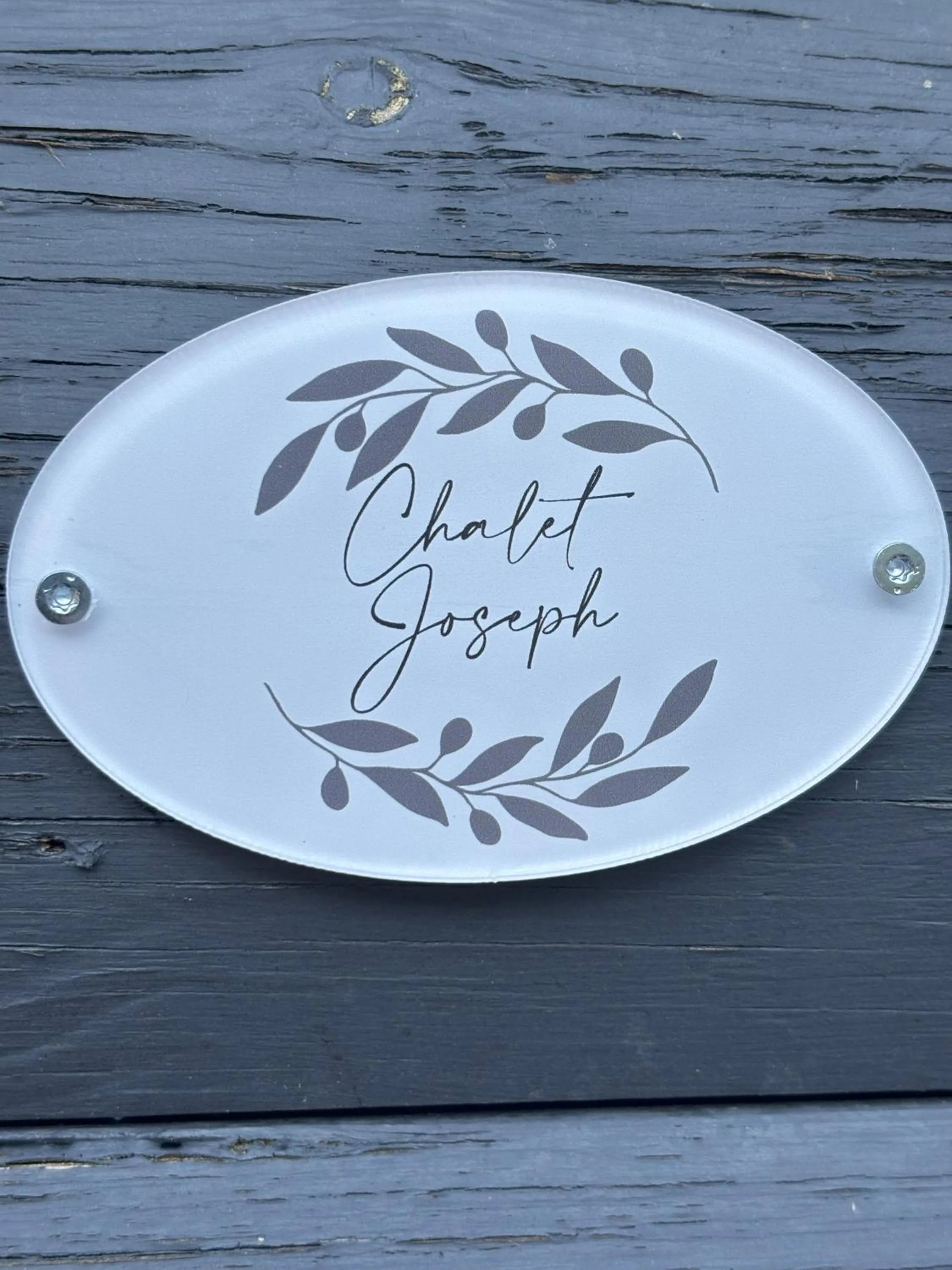 Property logo or sign in Kantor Village am Millstätter See - Boutique-Chalets und Lodges