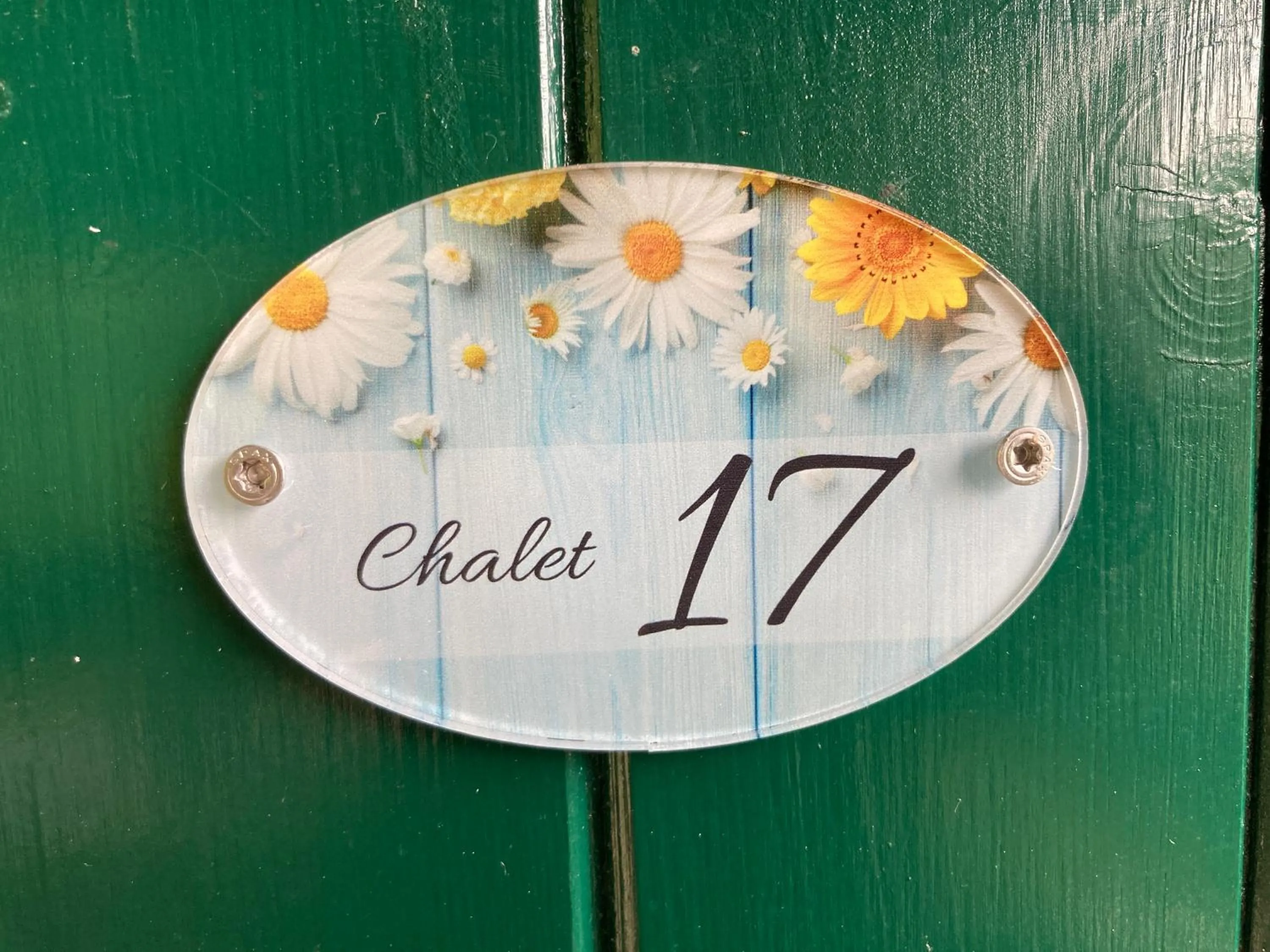 Property logo or sign in Kantor Village am Millstätter See - Boutique-Chalets und Lodges