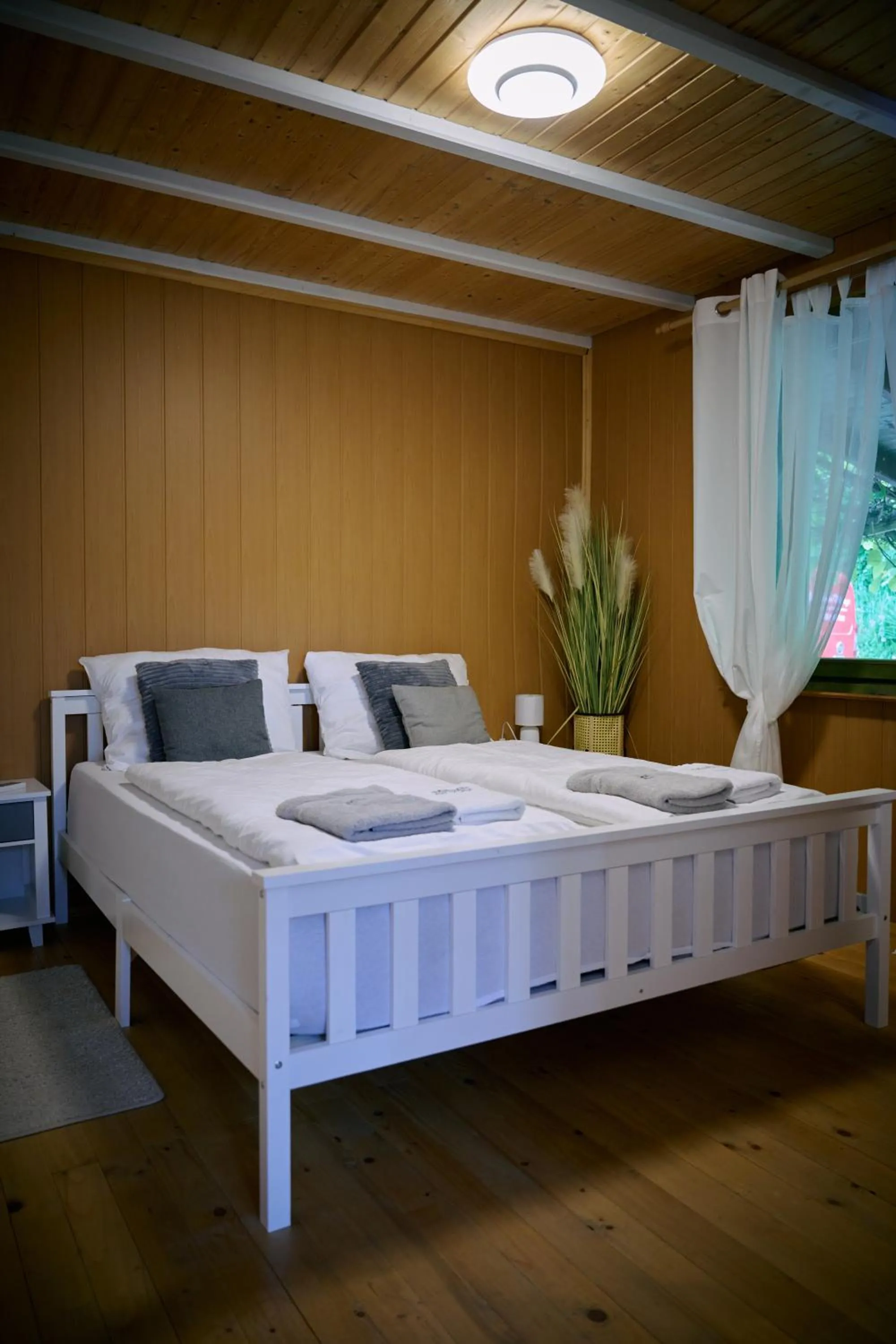 Bed in Kantor Village am Millstätter See - Boutique-Chalets und Lodges