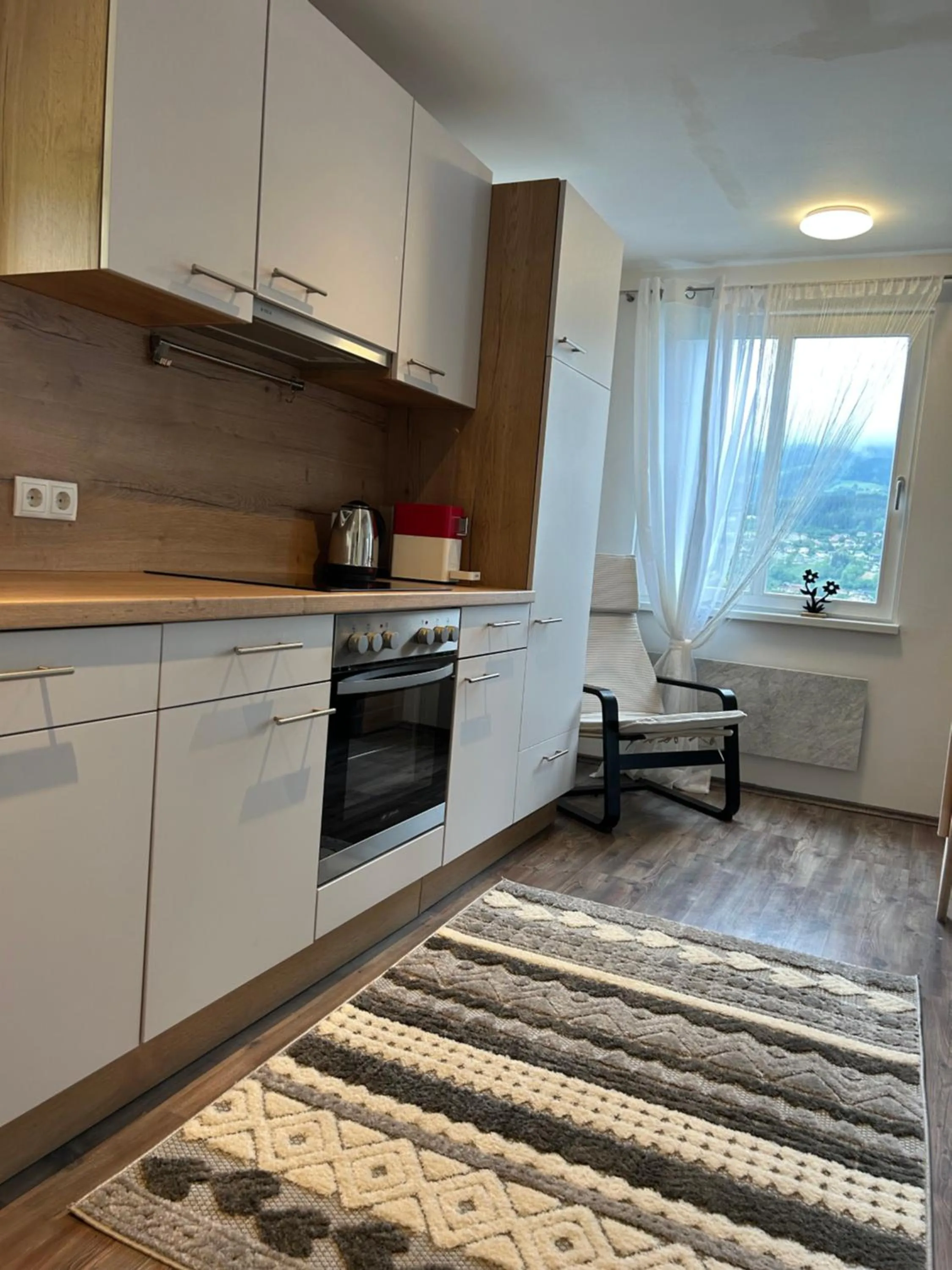 Kitchen or kitchenette in Kantor Village am Millstätter See - Boutique-Chalets und Lodges