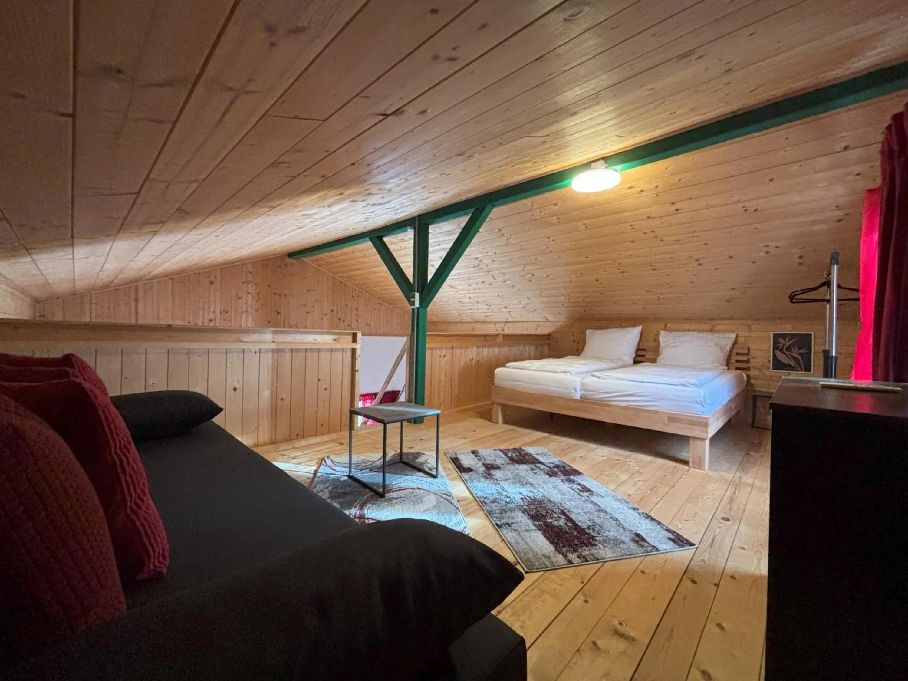 Living room, Bed in Kantor Village am Millstätter See - Boutique-Chalets und Lodges