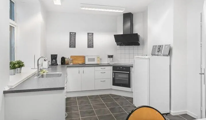 Kitchen or kitchenette in Hotel Stokkegaarden's BnB & Apartments
