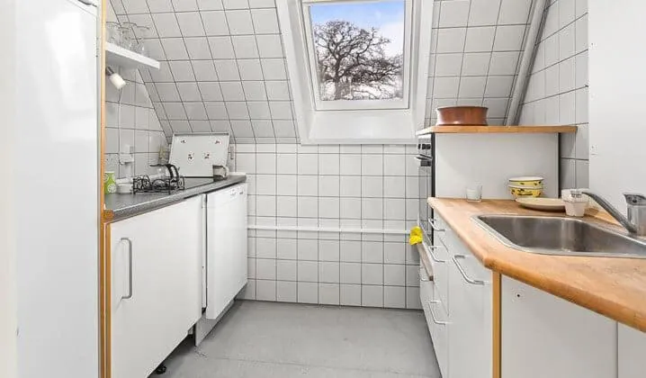 Kitchen or kitchenette in Hotel Stokkegaarden's BnB & Apartments