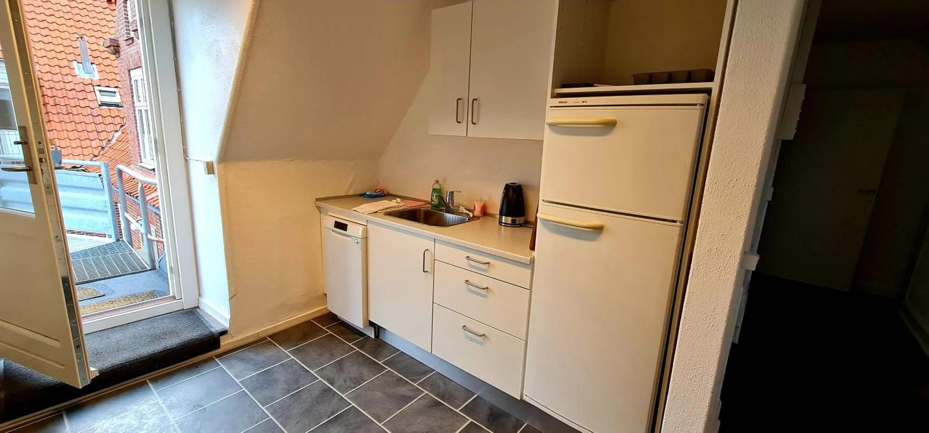 Kitchen or kitchenette in Hotel Stokkegaarden's BnB & Apartments