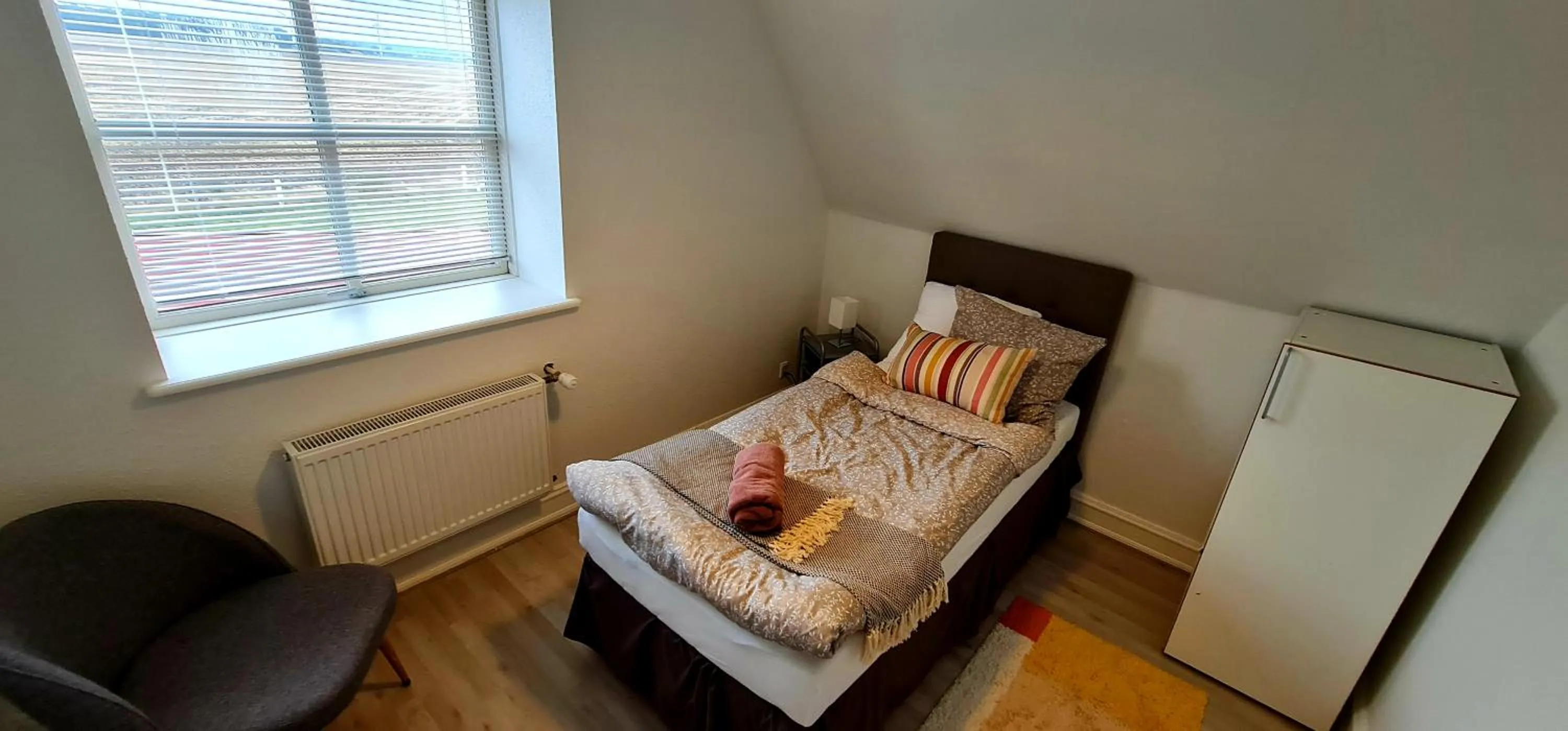 Bed in Hotel Stokkegaarden's BnB & Apartments