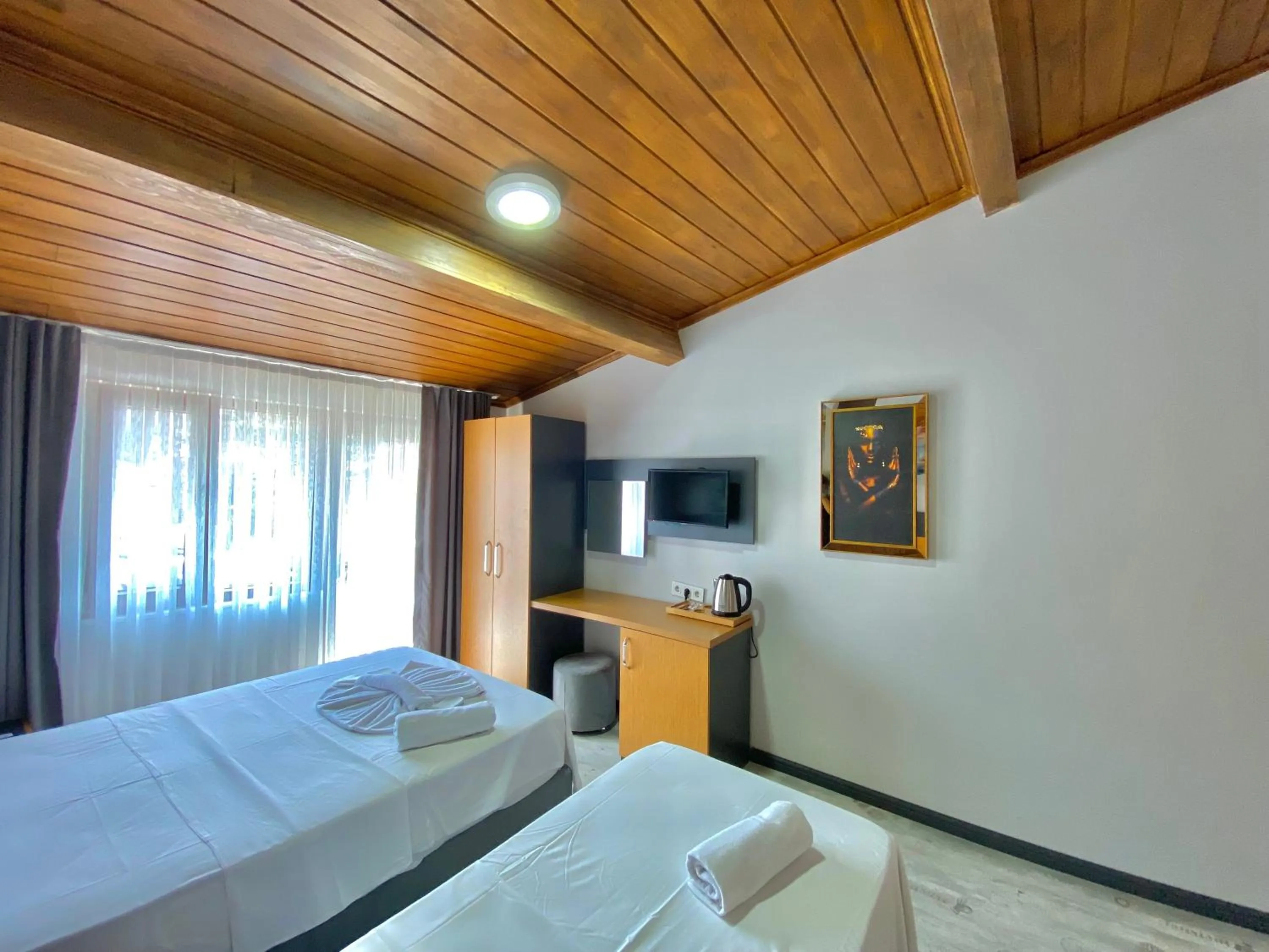 Bed in Victorious Hotel