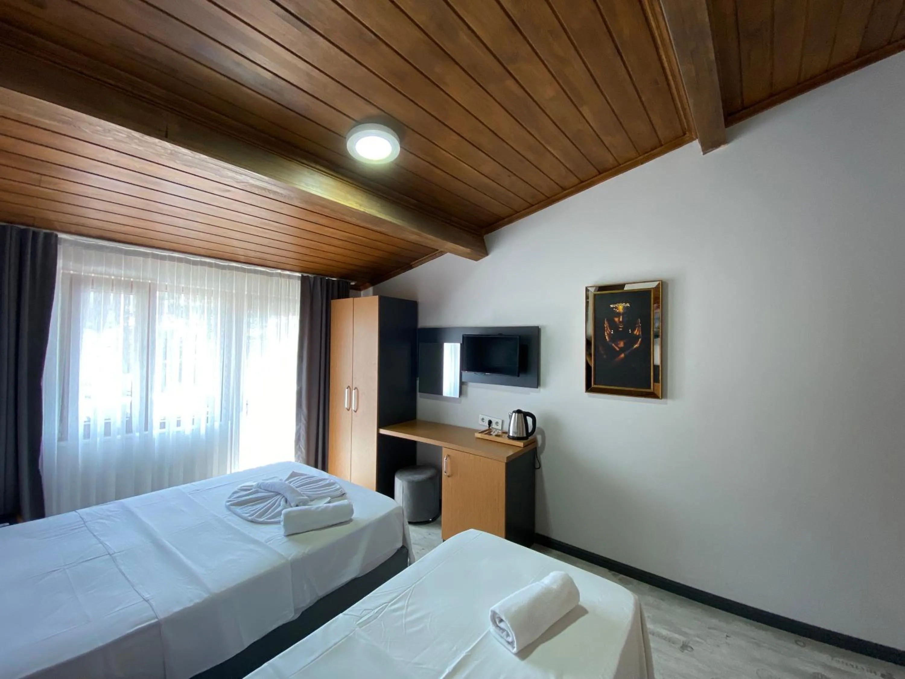 Bed in Victorious Hotel