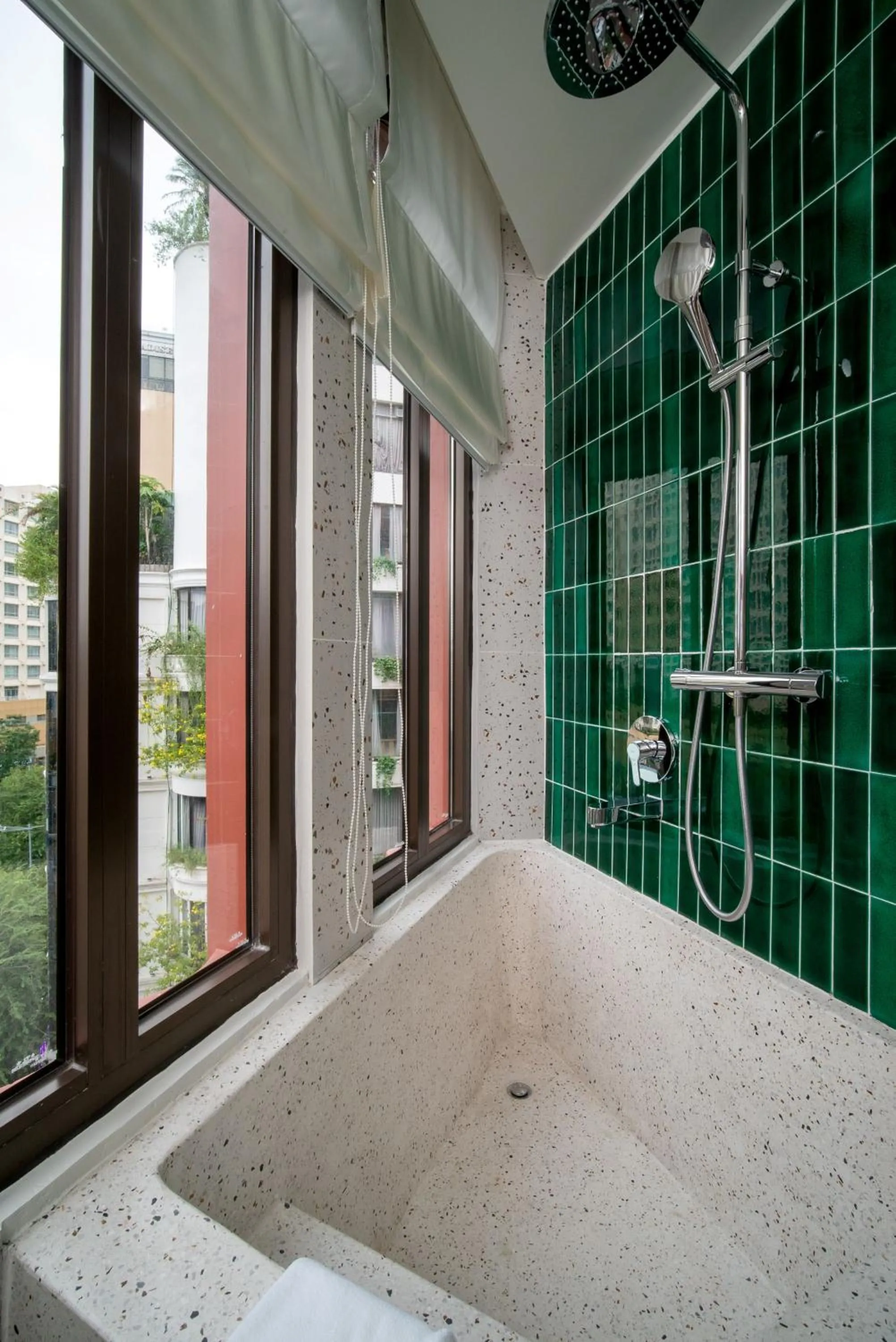 Shower in Me Saigon Boutique Hotel