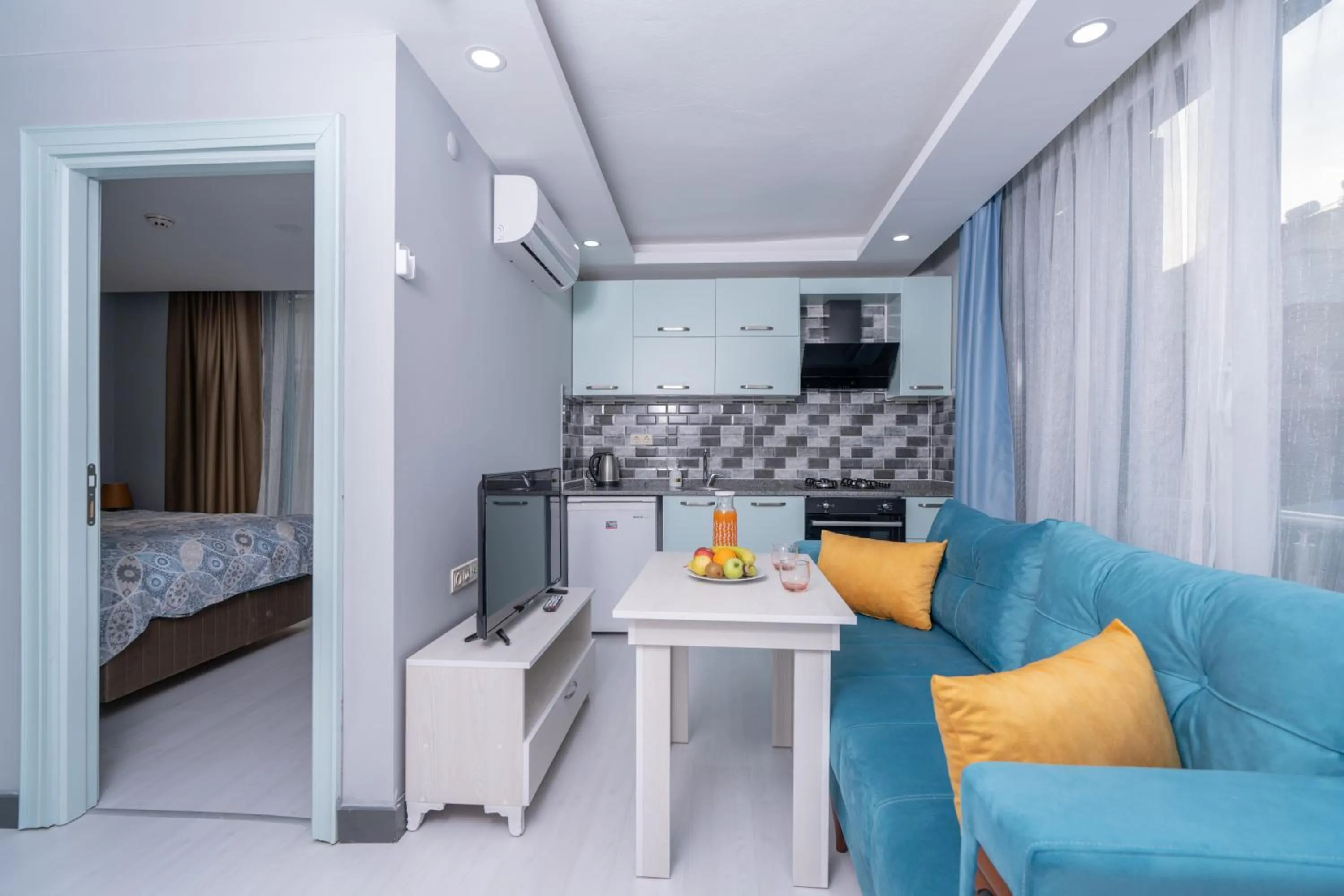 Seating area, Bed in Home Mood Apart Hotel