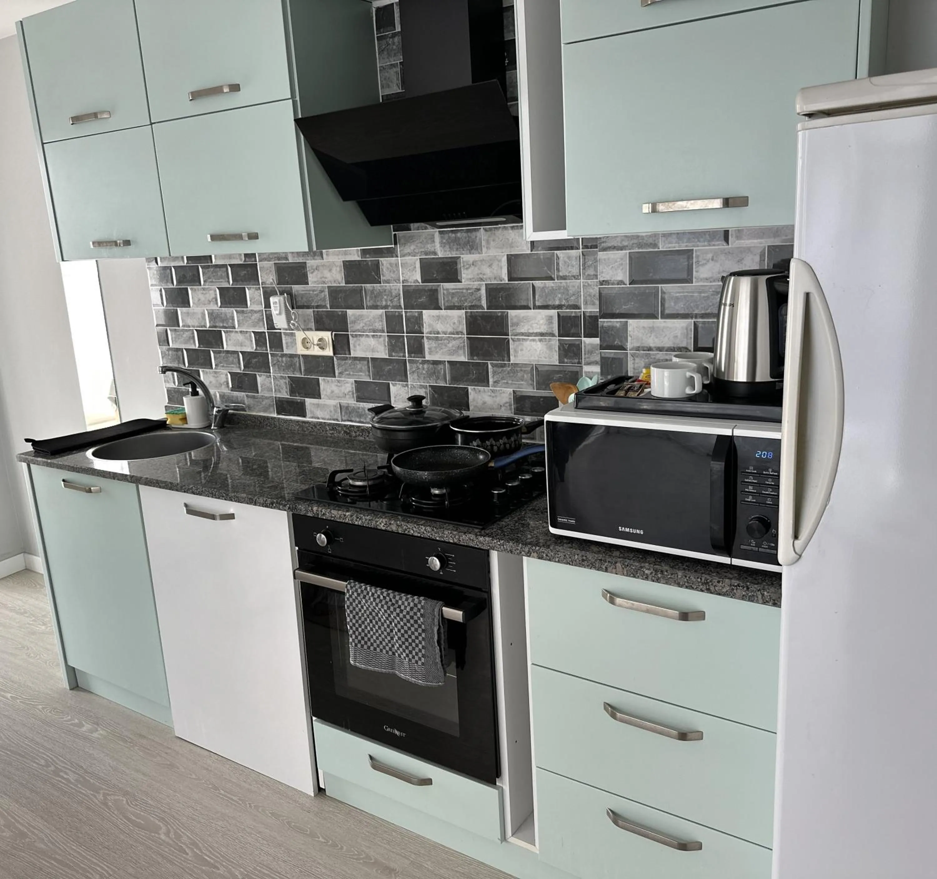 Kitchen or kitchenette in Home Mood Apart Hotel