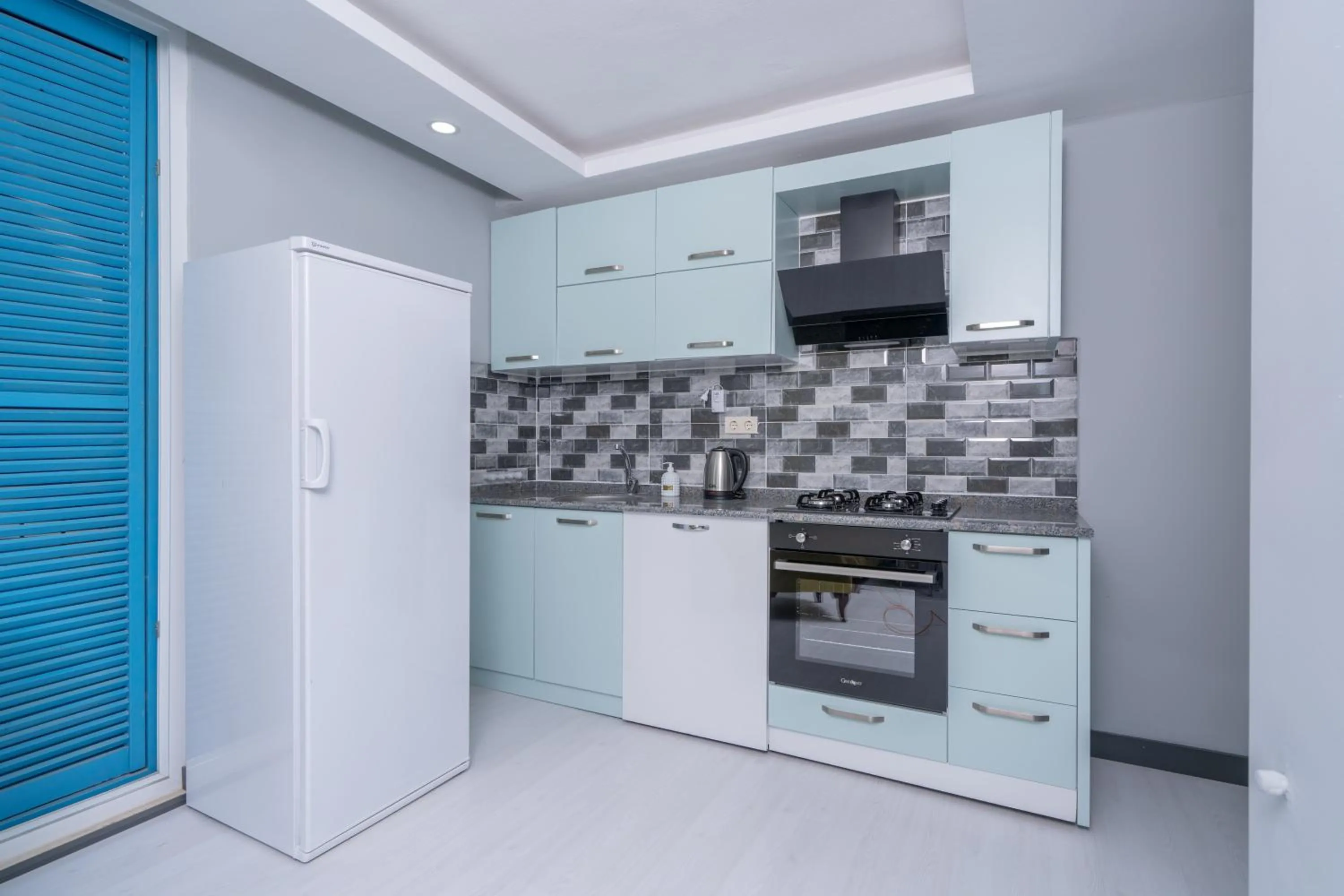 Kitchen or kitchenette in Home Mood Apart Hotel