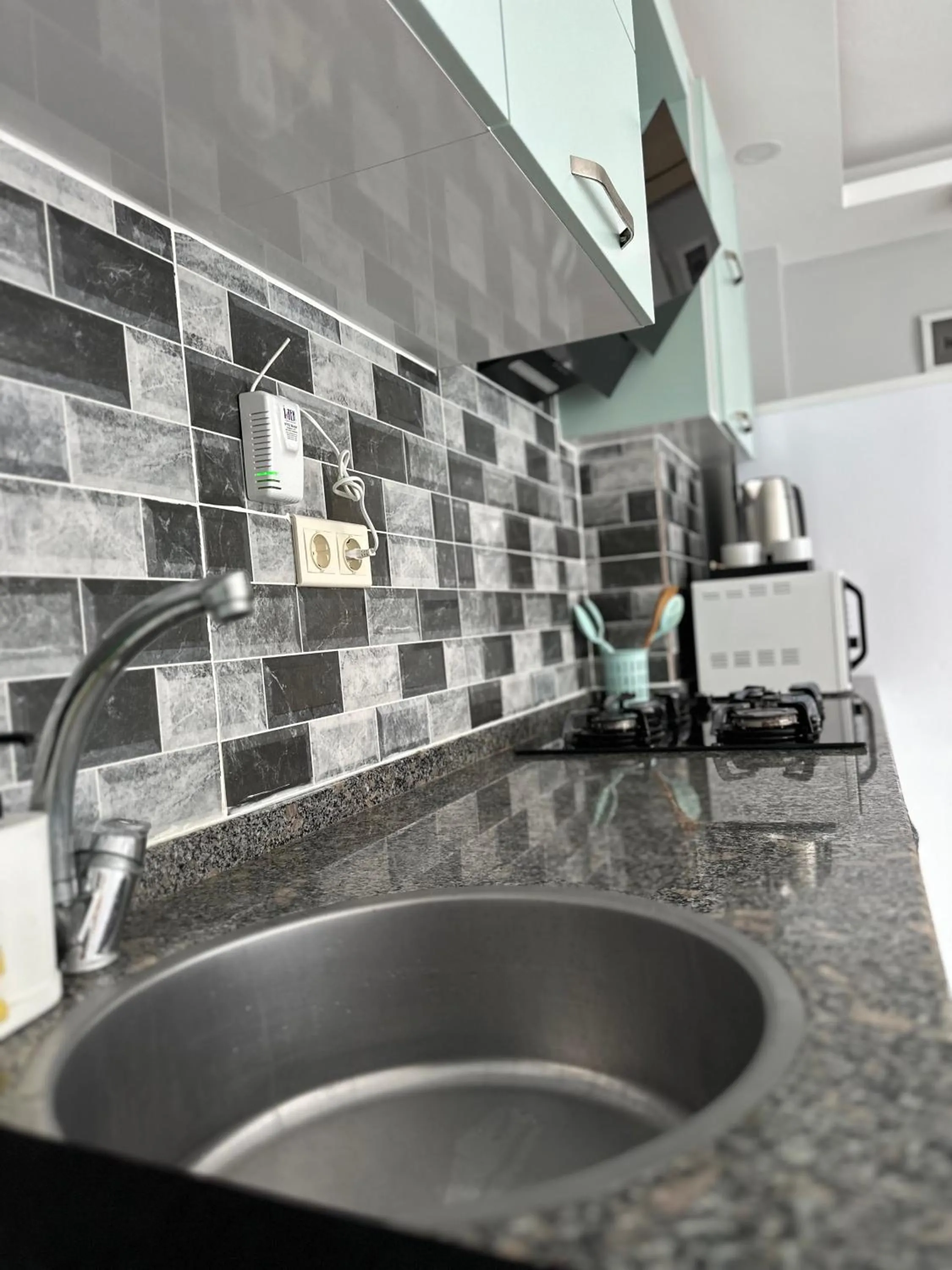 Kitchen or kitchenette in Home Mood Apart Hotel