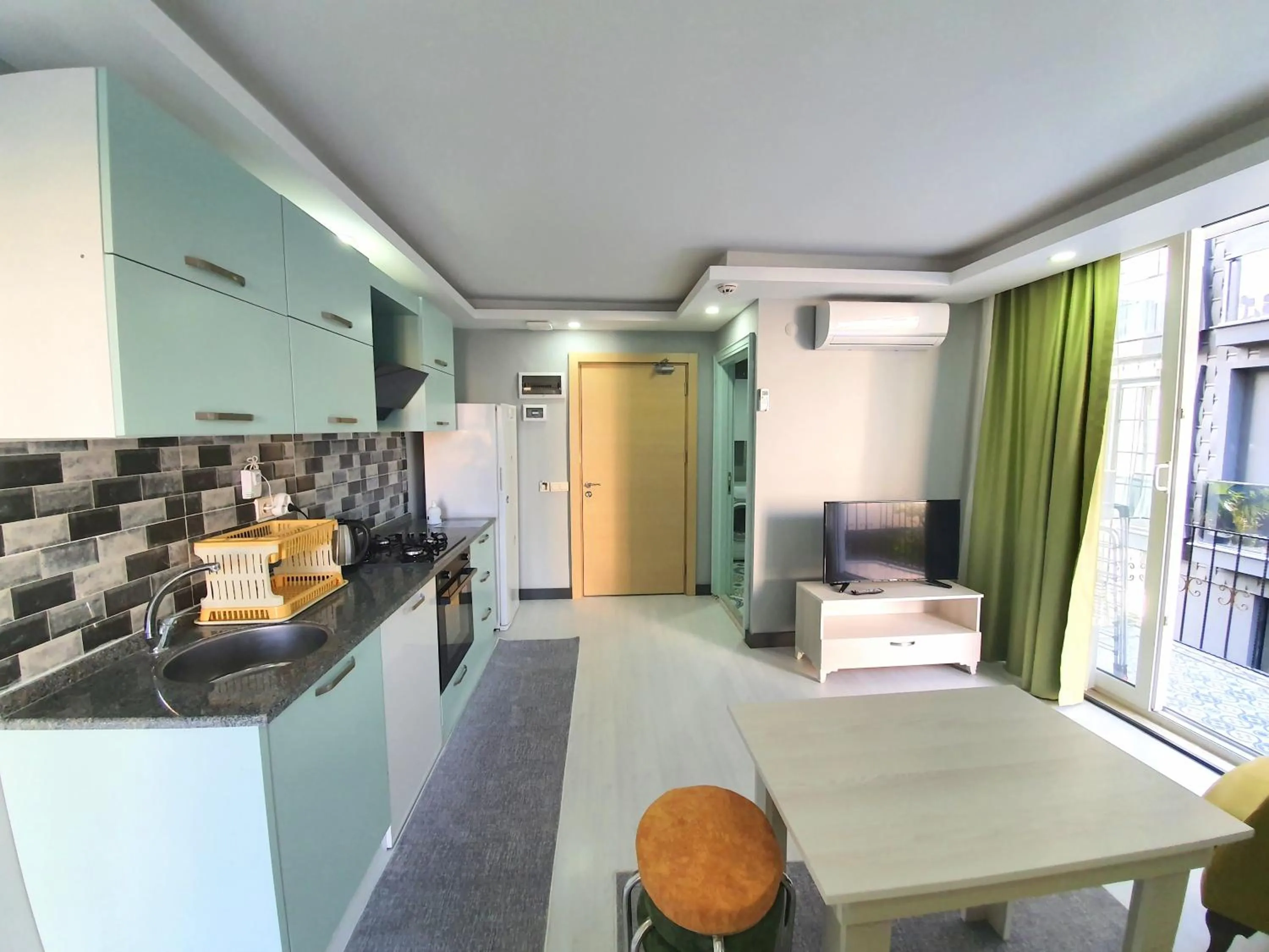 Kitchen or kitchenette in Home Mood Apart Hotel