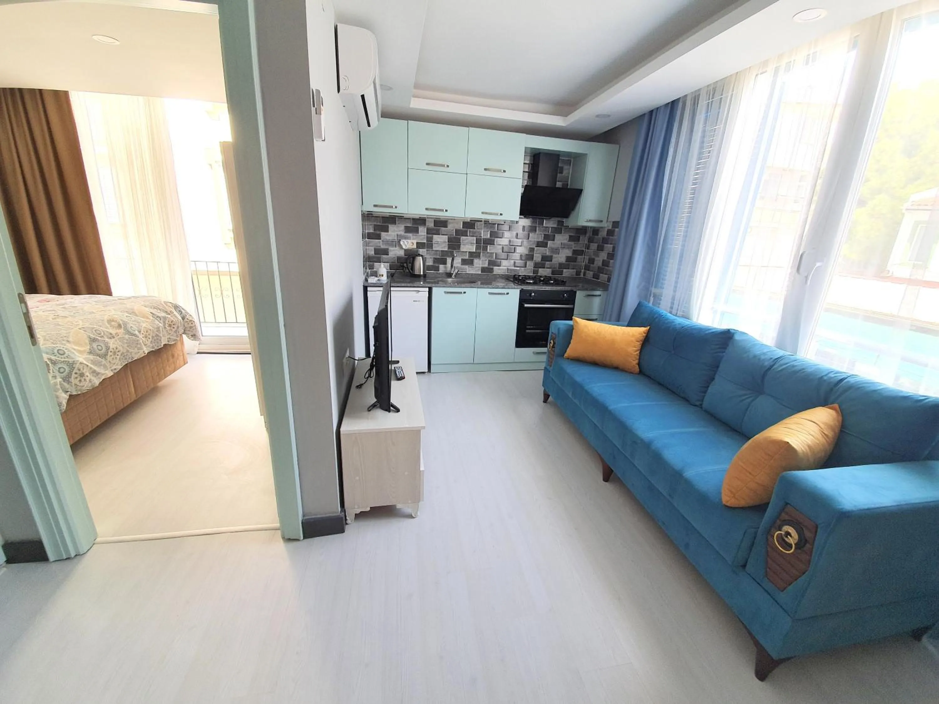 Living room, Bed in Home Mood Apart Hotel