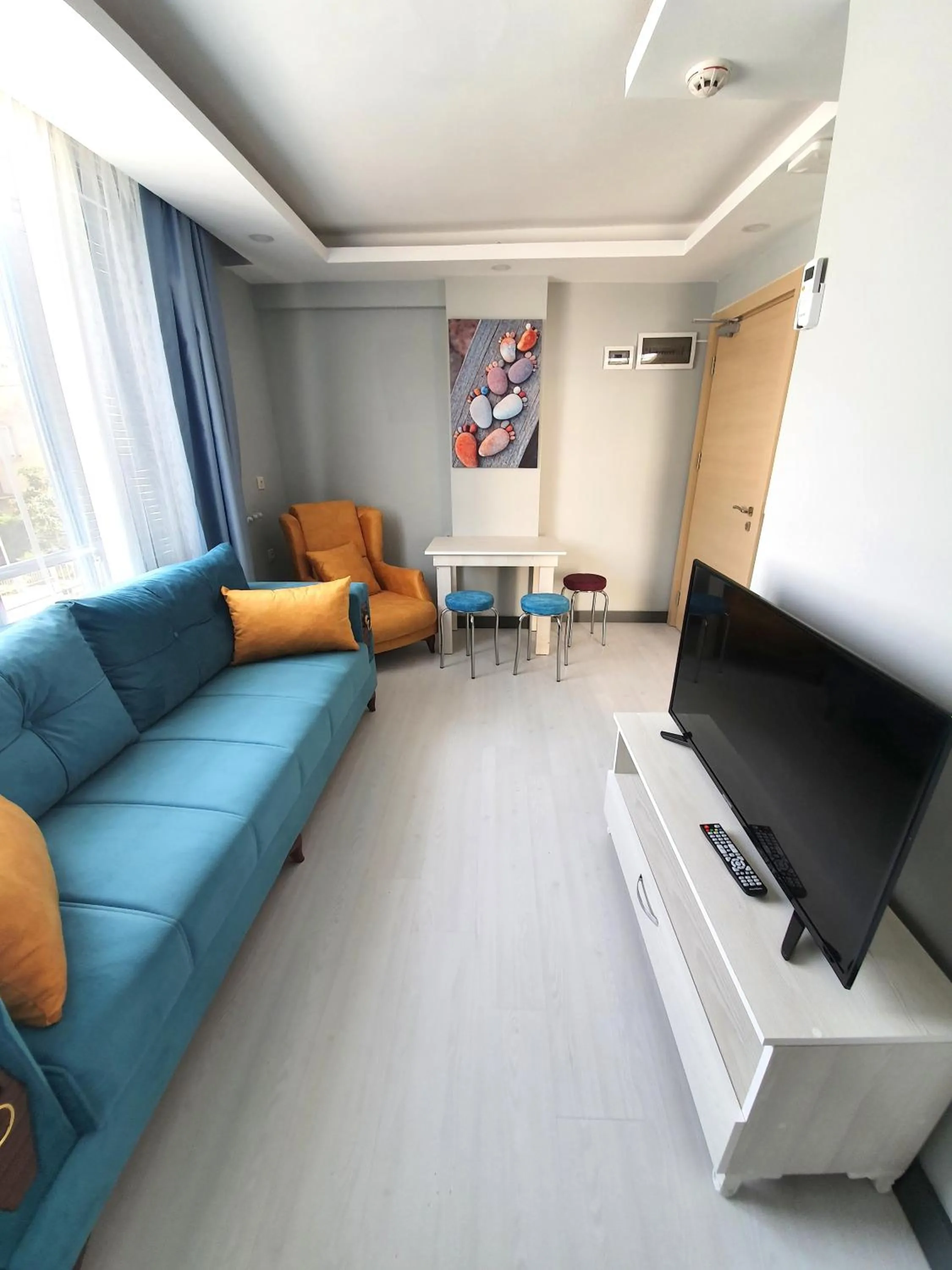TV and multimedia in Home Mood Apart Hotel