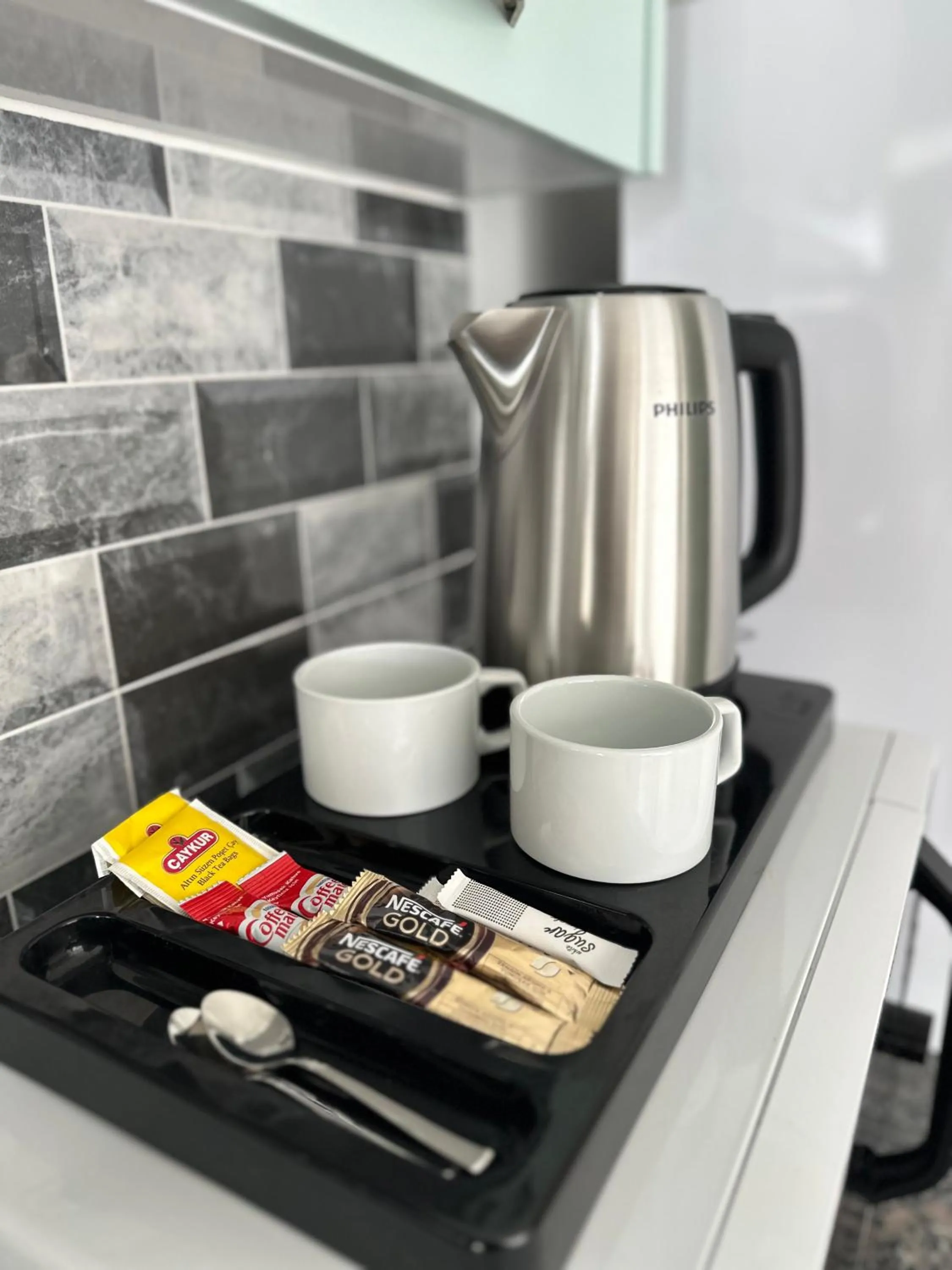 Kitchen or kitchenette in Home Mood Apart Hotel