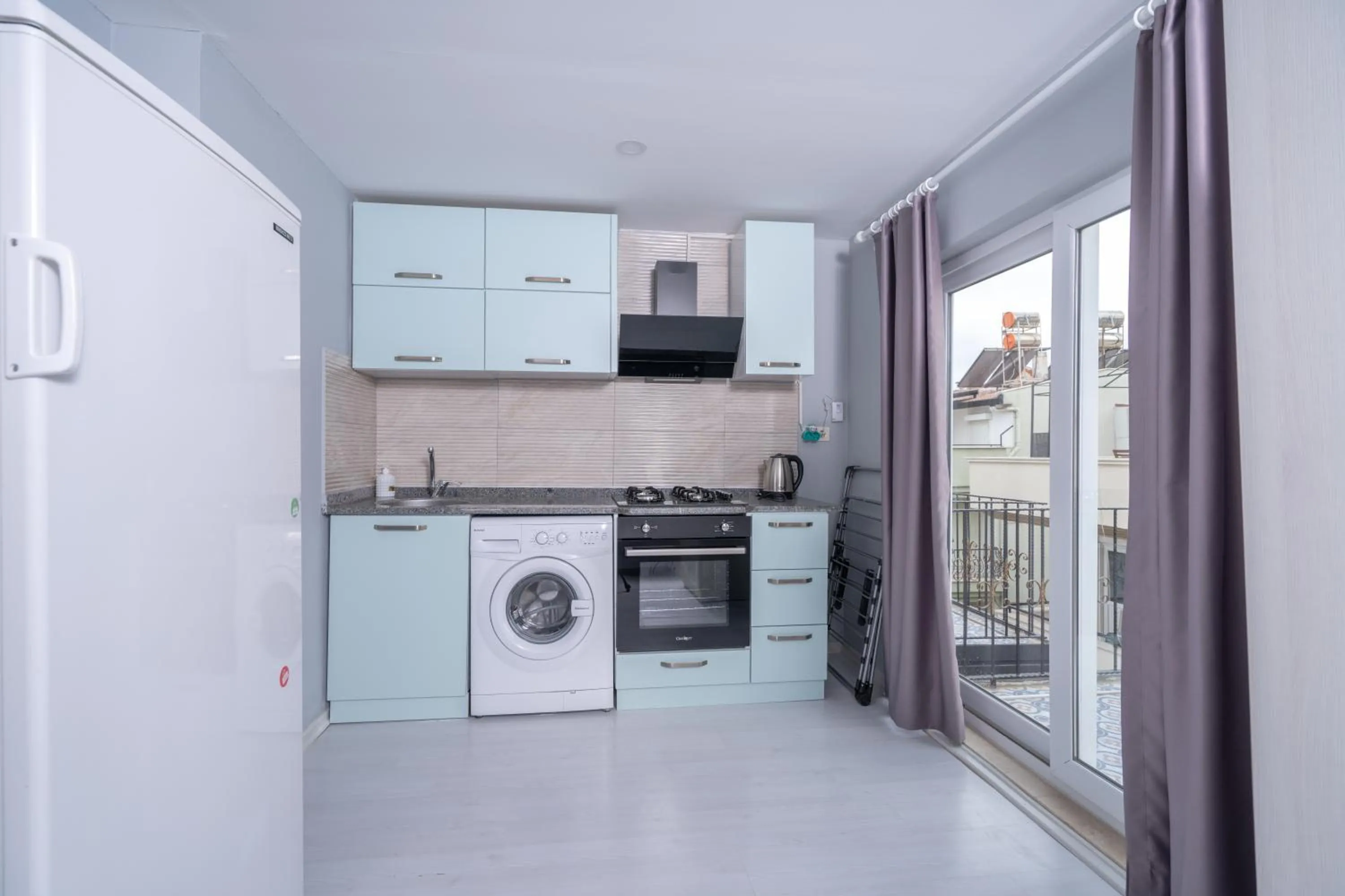 Kitchen or kitchenette in Home Mood Apart Hotel