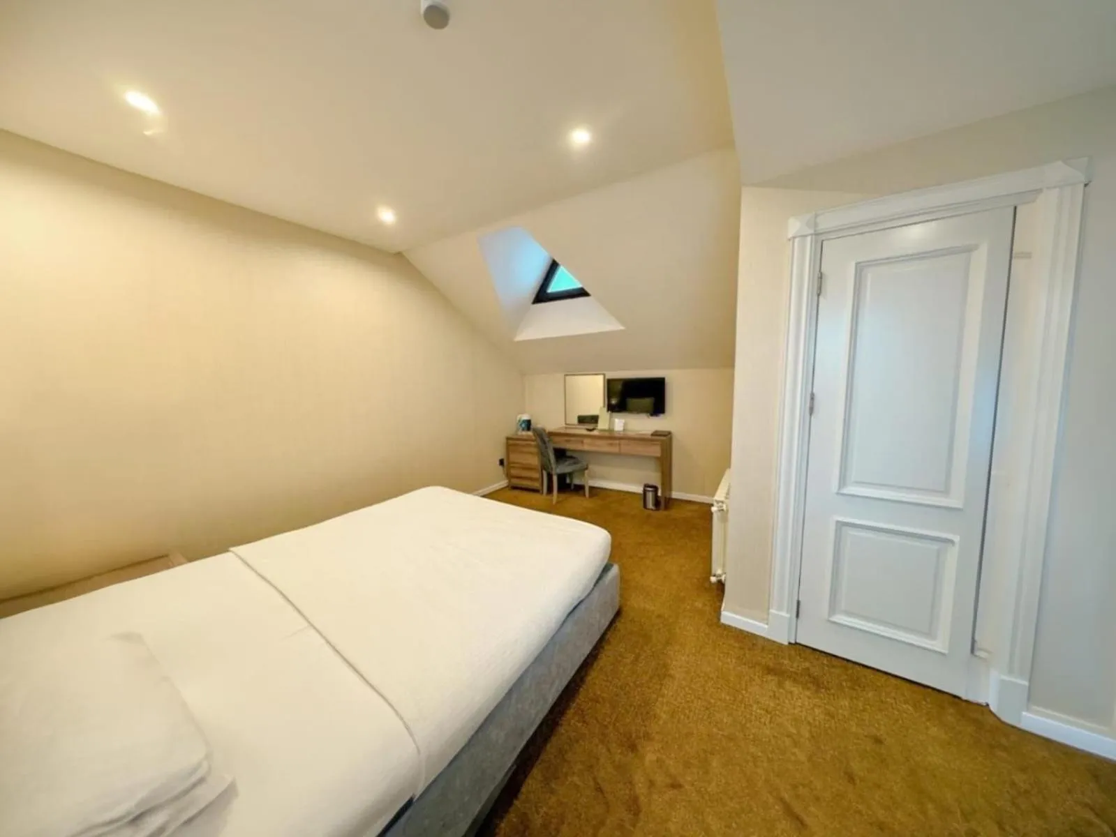 Bed in Grand Midway Hotel