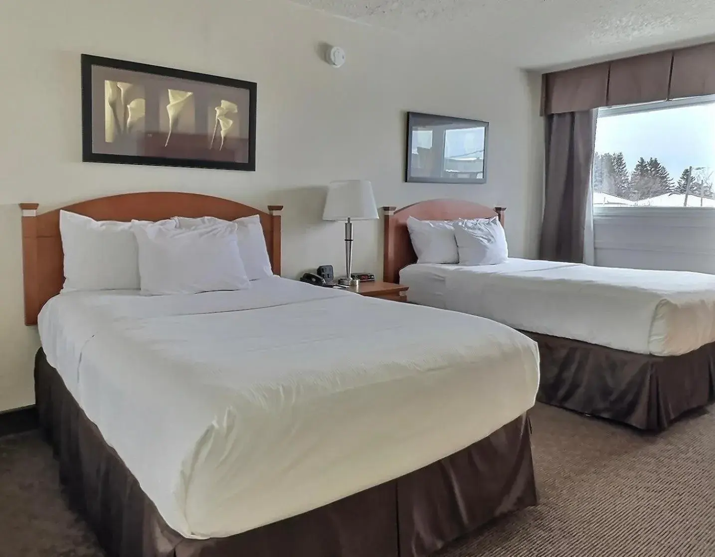 Bed in Quality Inn Rouyn-Noranda Bed in Quality Inn Rouyn-Noranda