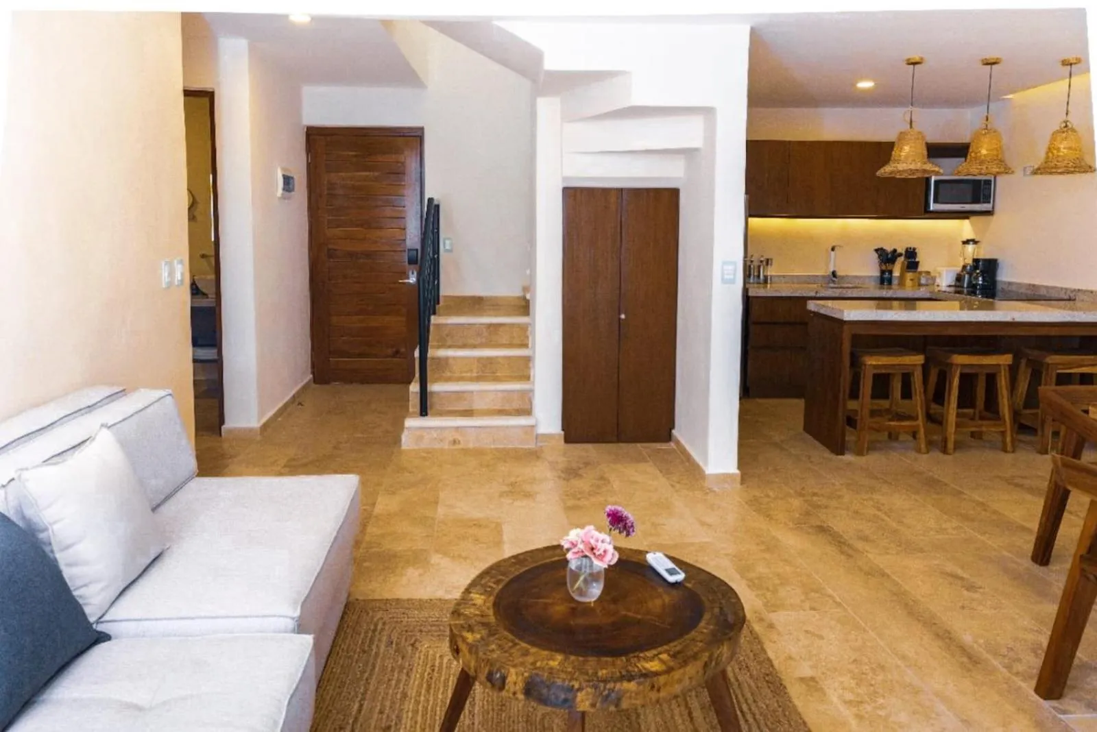 Living room in The Waves Tulum by BNB Experience