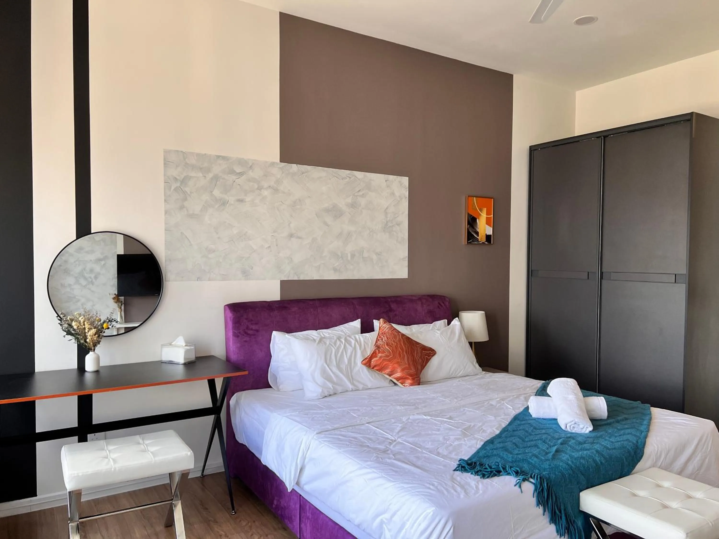 Bed in Ceylonz Suites by Living Signature