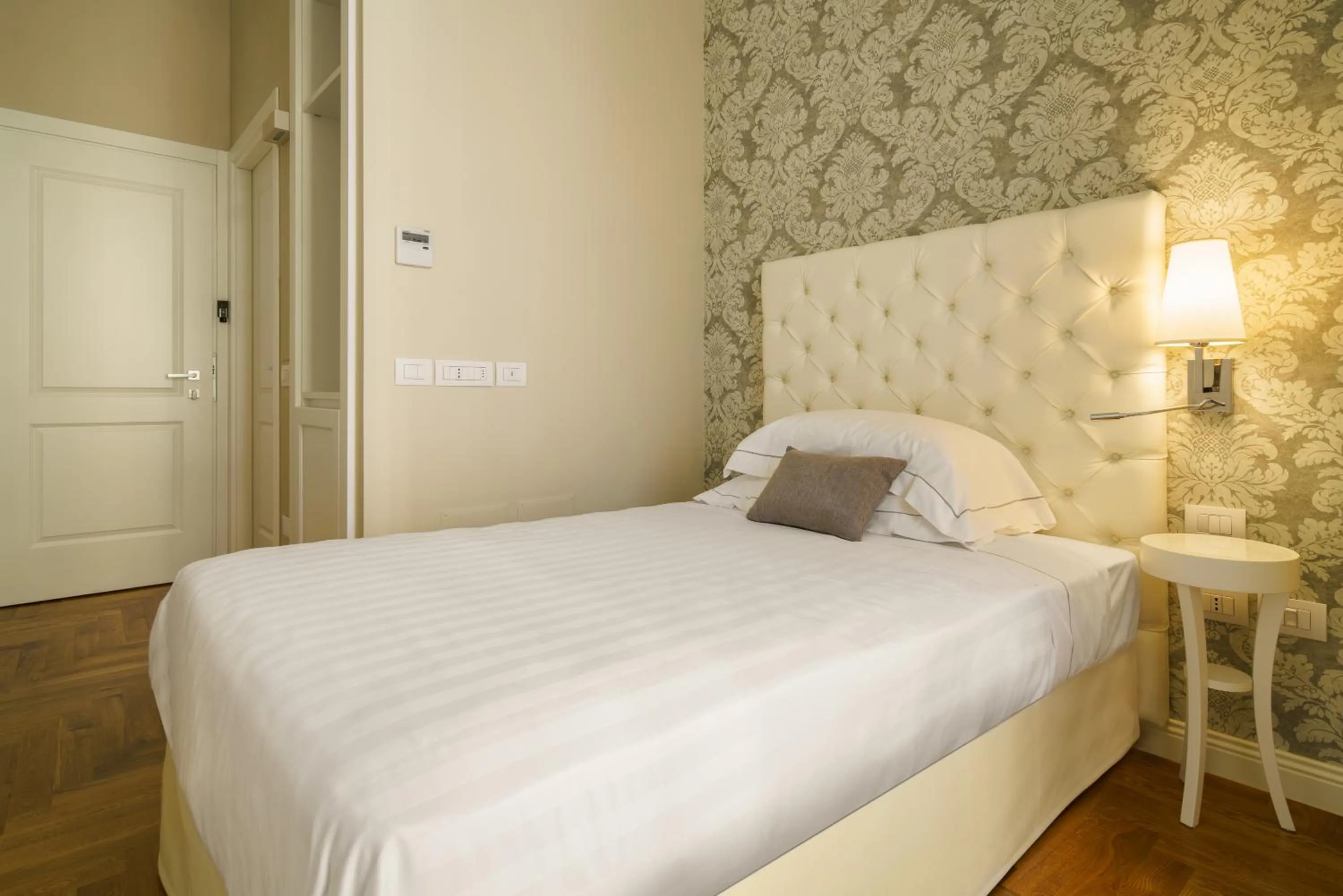 Bed in Boutique Hotel Carlo Felice