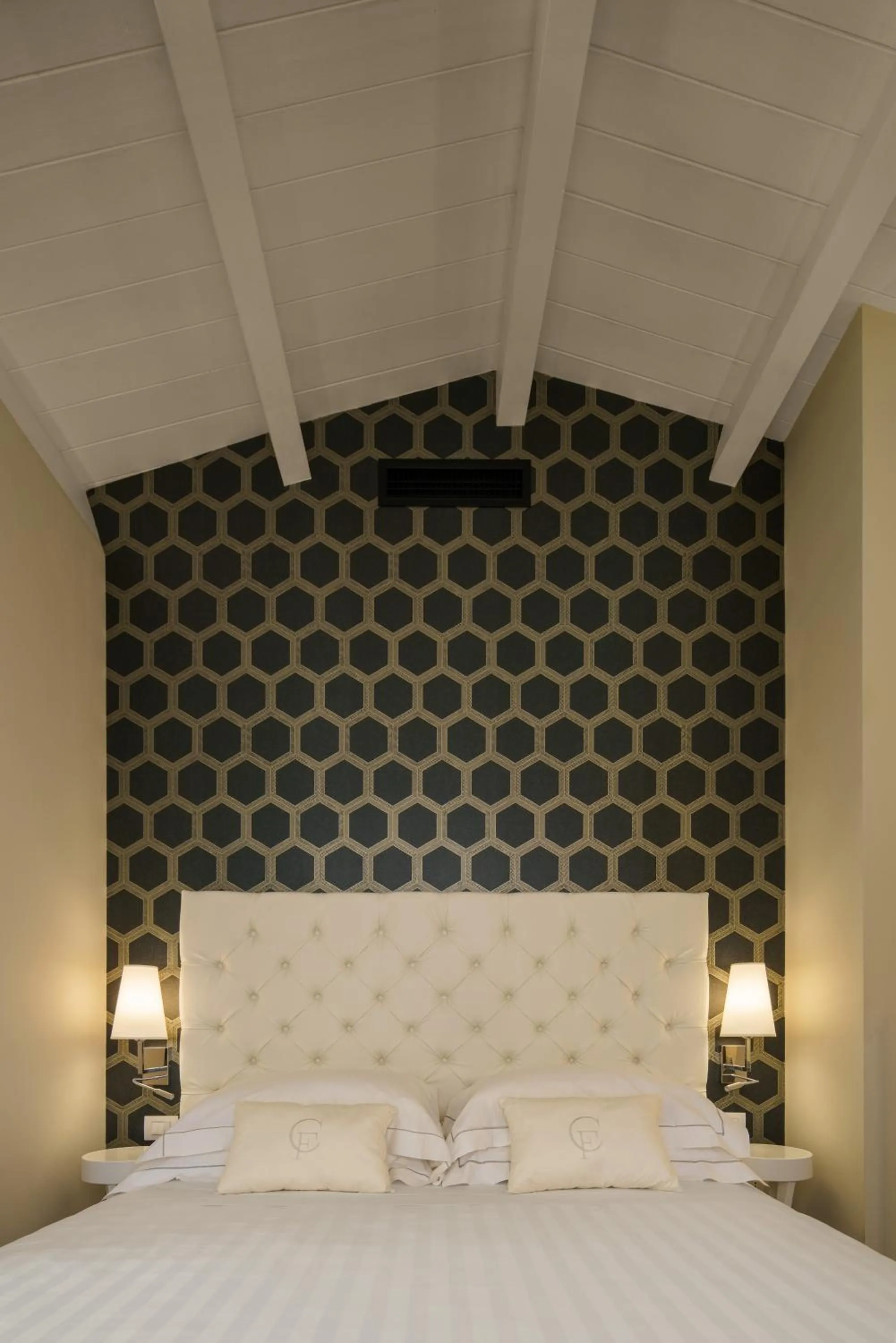 Bed in Boutique Hotel Carlo Felice