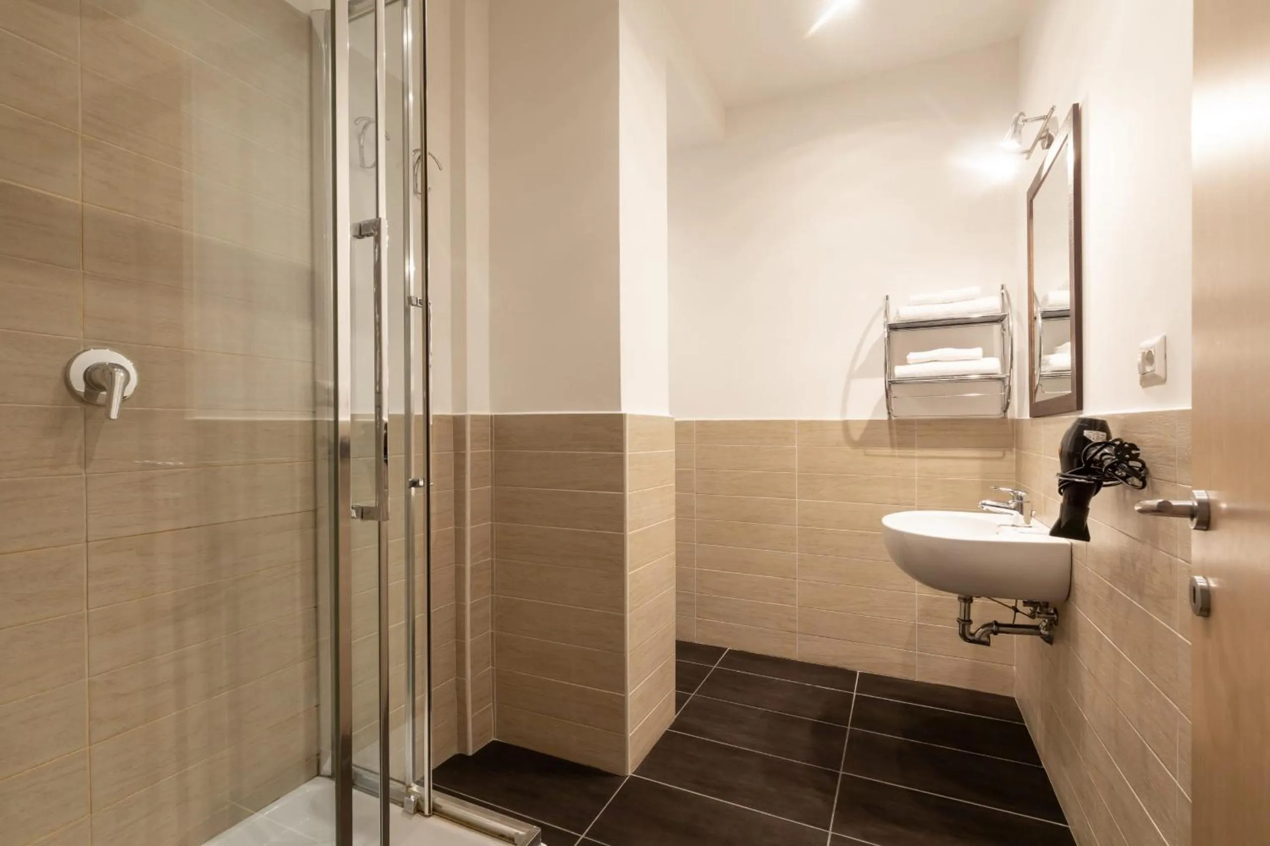 Shower in Fleming Suites by Hili