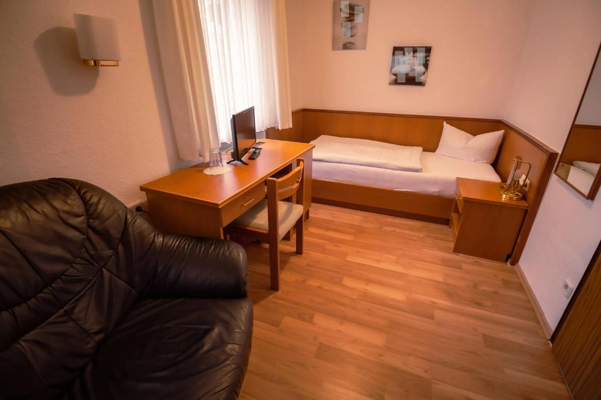 Bed in Hotel-Pension Ursula